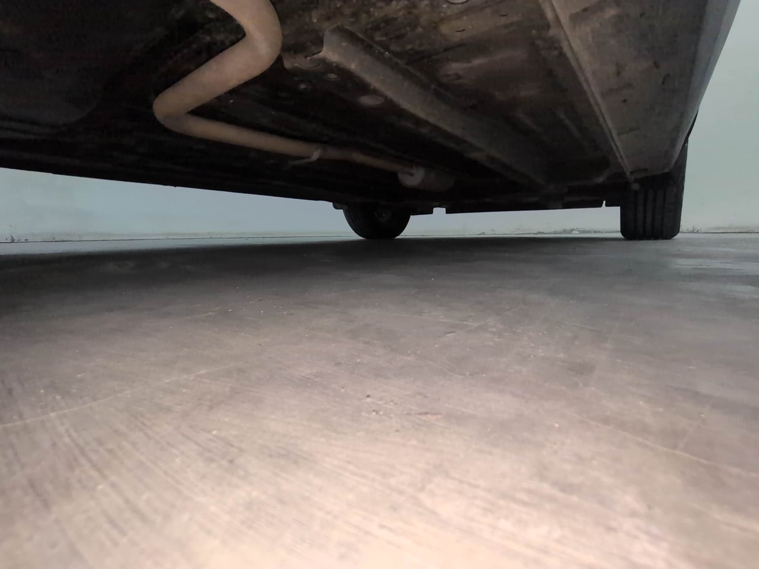 Used 2023 Tata Punch Creative Dual Tone AMT Petrol Automatic extra REAR RIGHT UNDERBODY VIEW