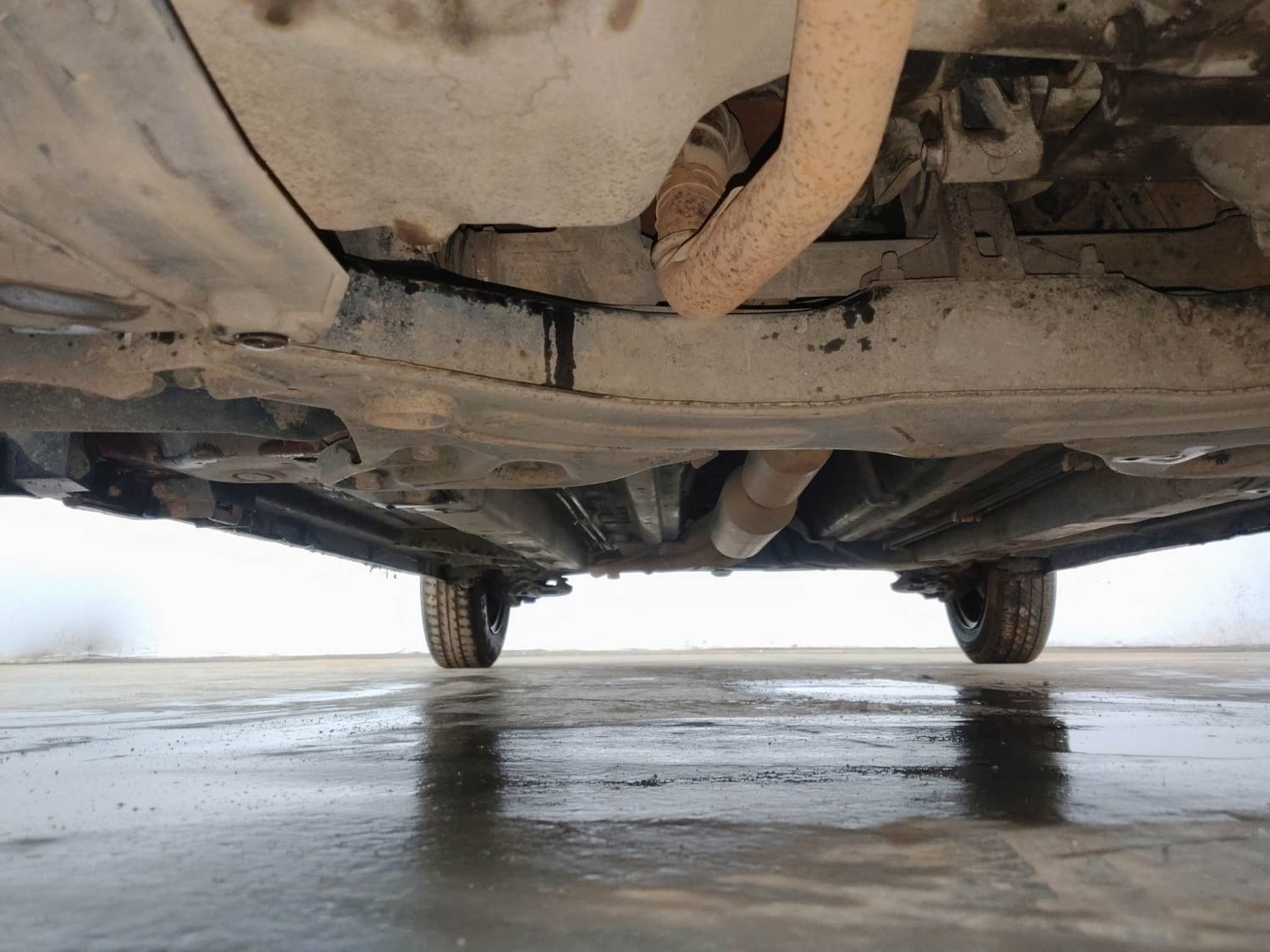 Used 2014 Maruti Suzuki Swift VXi Petrol Manual extra FRONT LEFT UNDERBODY VIEW