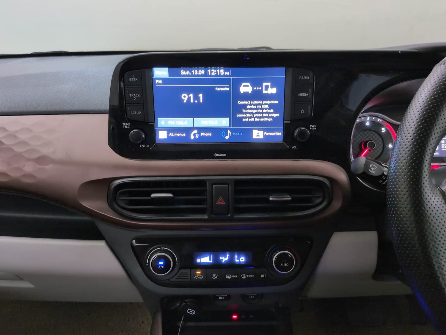 Used 2020 Hyundai Aura SX Plus 1.2 AMT CRDi Diesel Automatic interior MUSIC SYSTEM & AC CONTROL VIEW