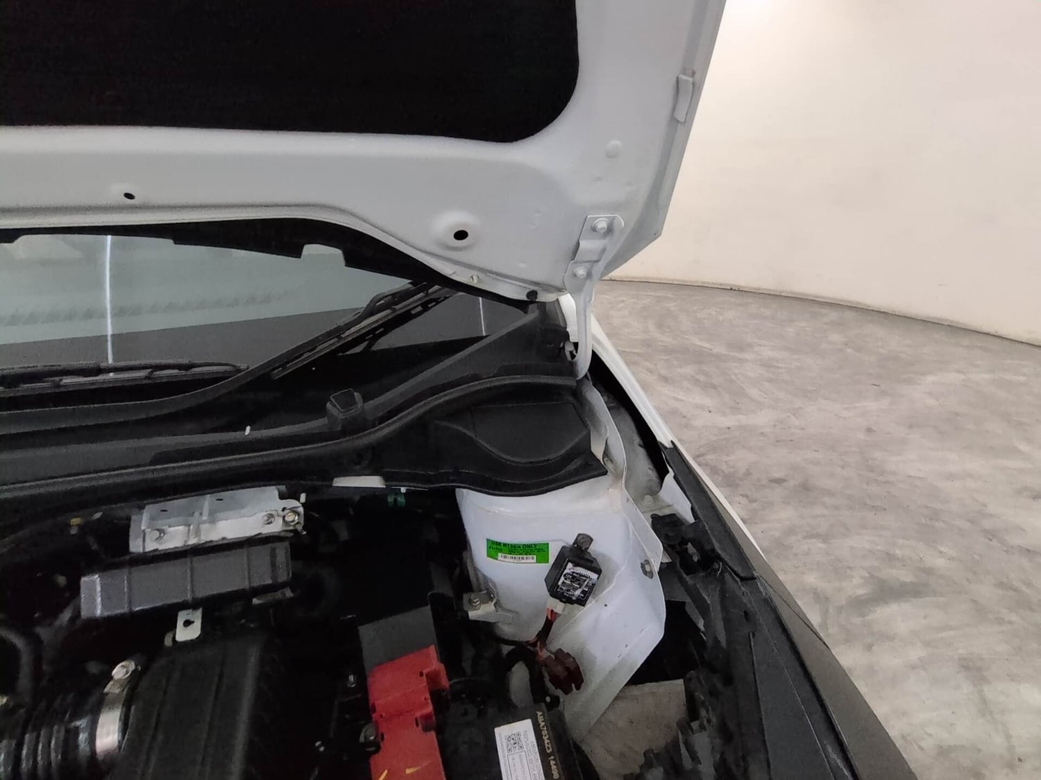 Used 2026 Tata Altroz Creative Petrol 5MT Petrol Manual engine ENGINE LEFT SIDE HINGE & APRON VIEW