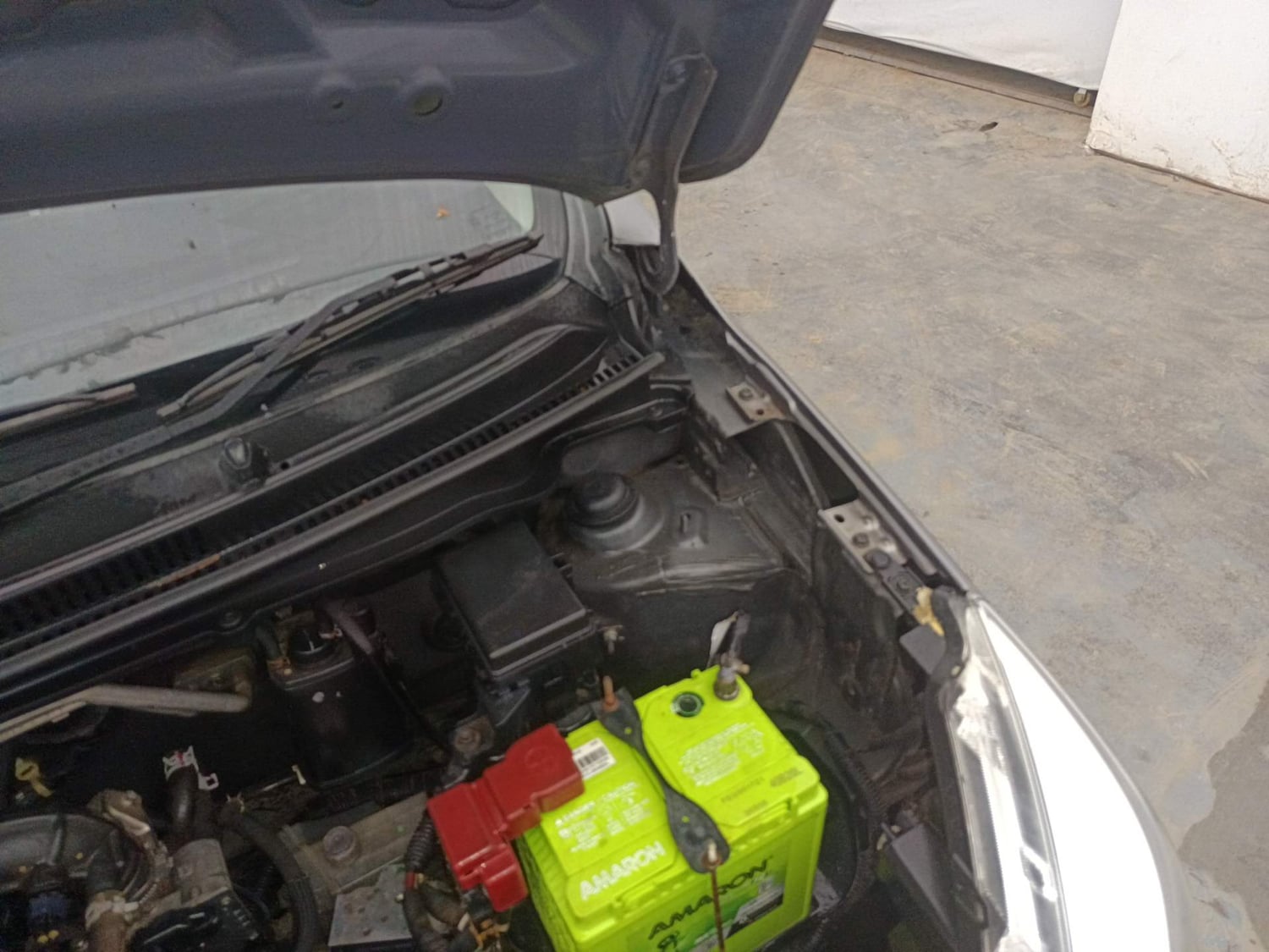 Used 2014 Maruti Suzuki Celerio VXi AMT Petrol Automatic engine ENGINE LEFT SIDE HINGE & APRON VIEW
