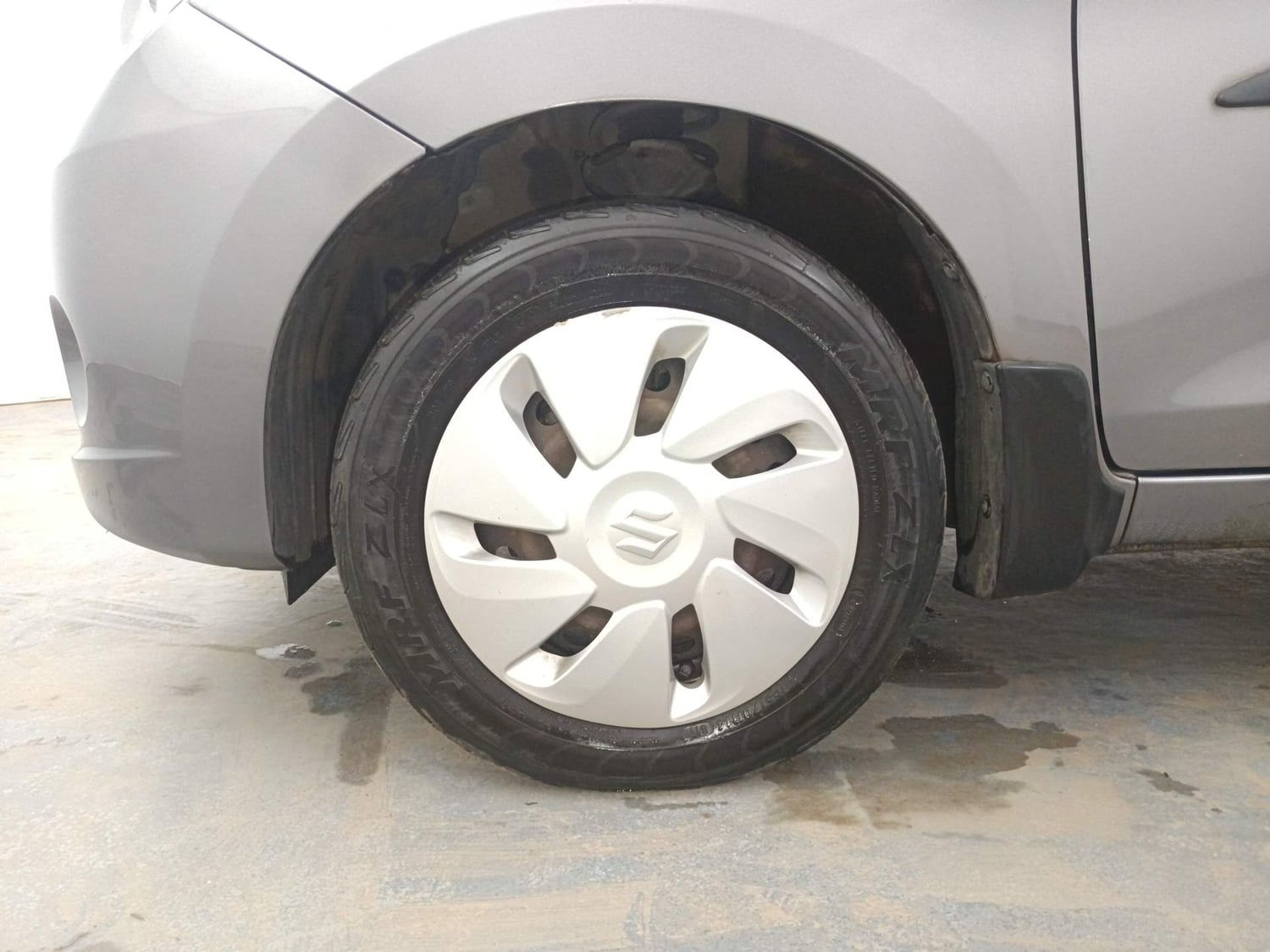 Used 2014 Maruti Suzuki Celerio VXi AMT Petrol Automatic tyres LEFT FRONT TYRE RIM VIEW