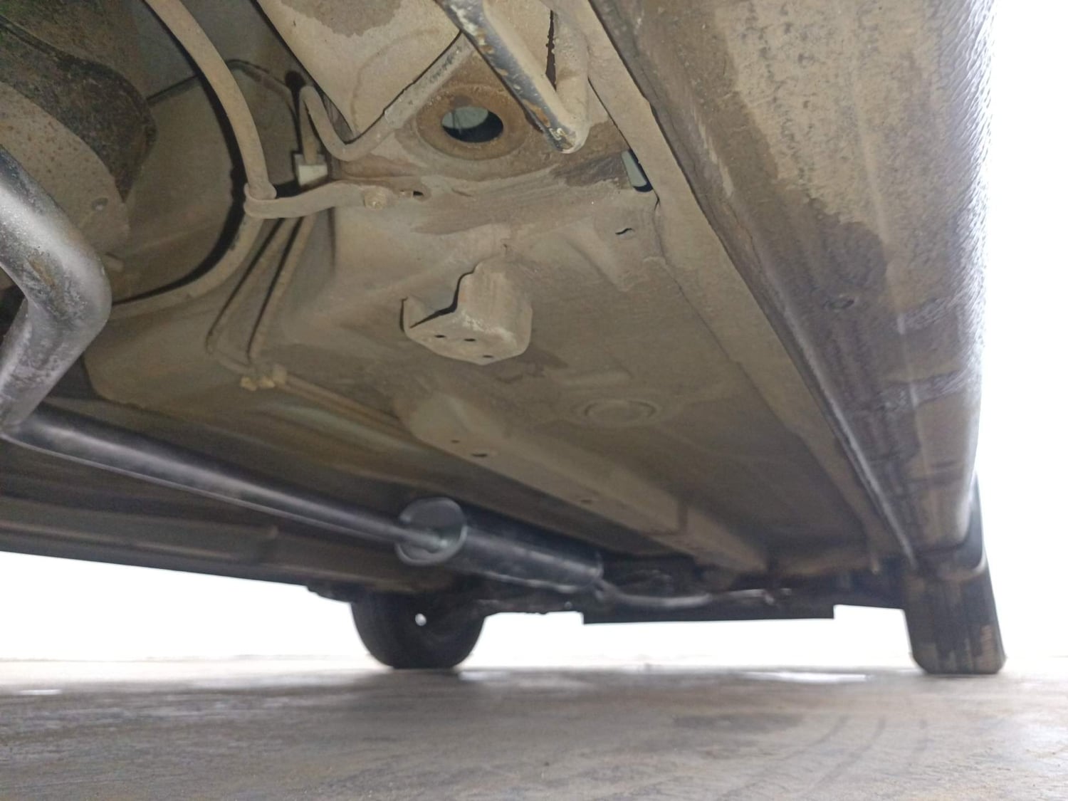 Used 2014 Maruti Suzuki Celerio VXi AMT Petrol Automatic extra REAR RIGHT UNDERBODY VIEW