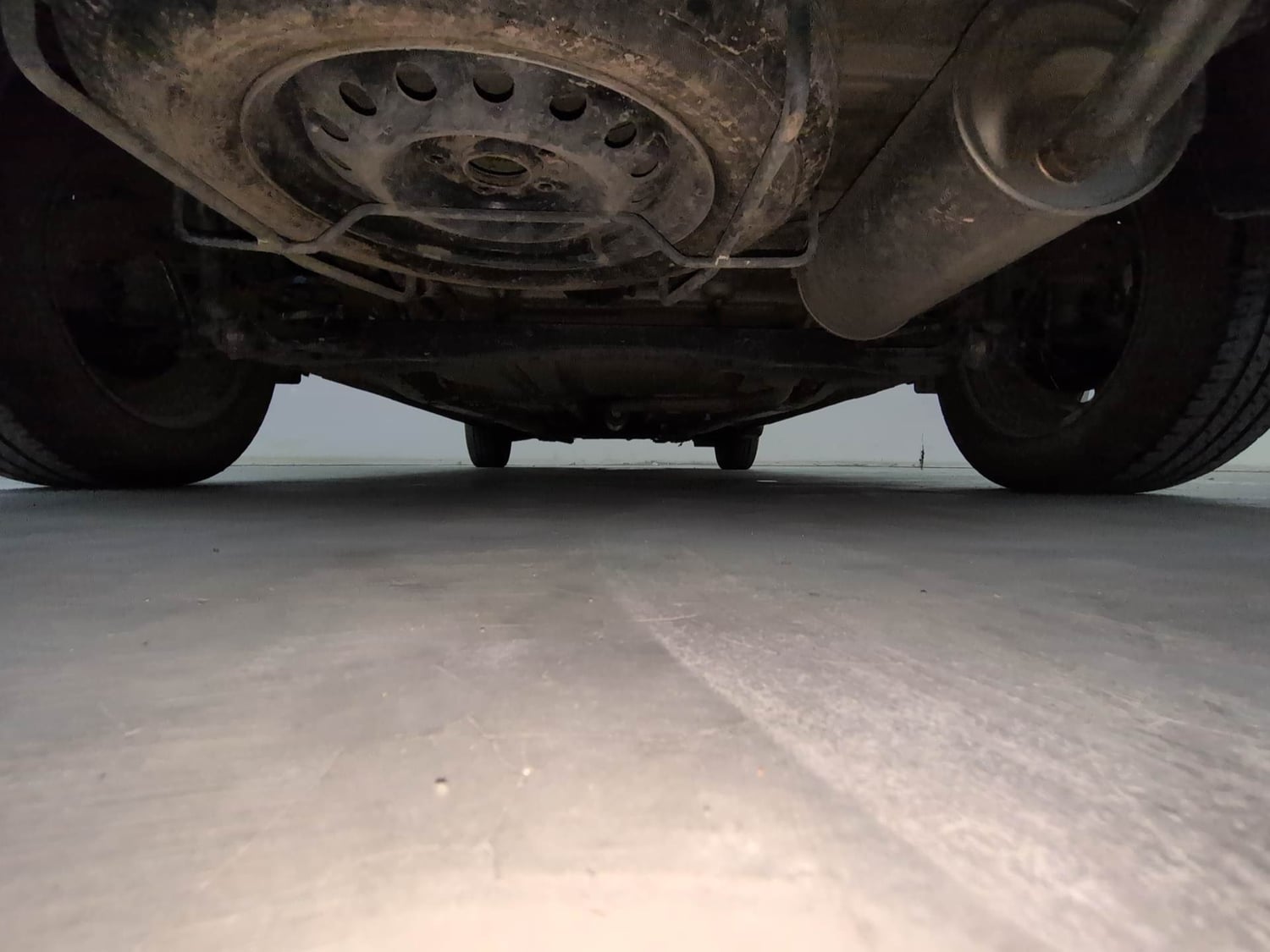 Used 2023 Maruti Suzuki Ertiga VXi AT Petrol Automatic extra REAR UNDERBODY VIEW (TAKEN FROM REAR)