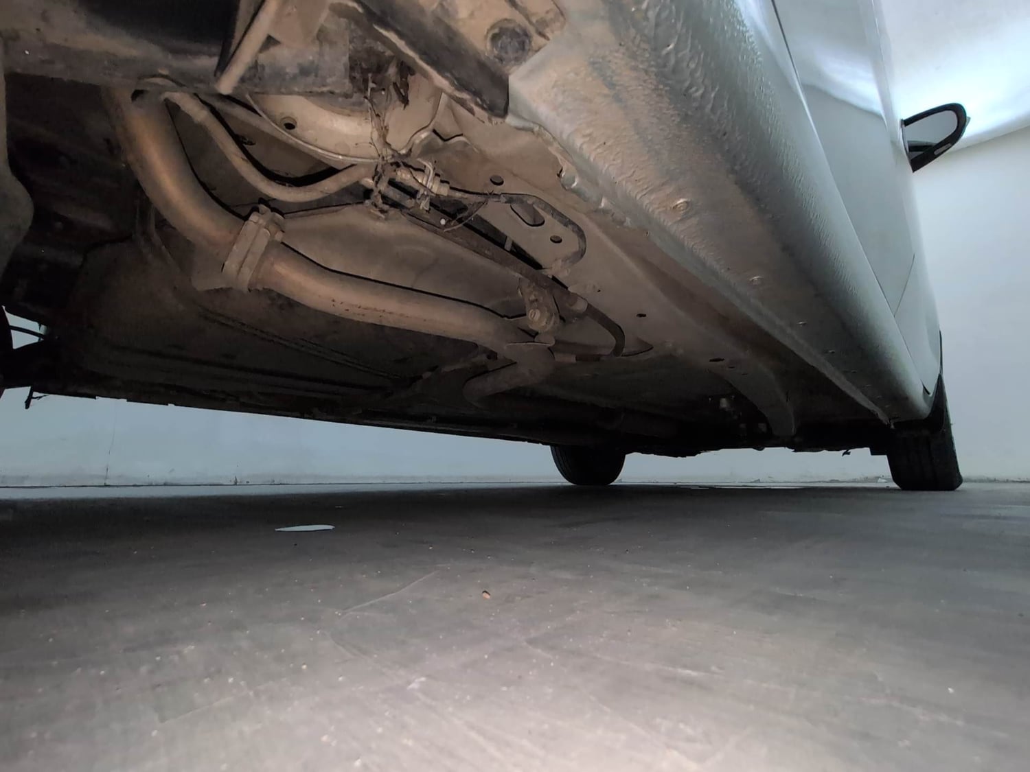 Used 2023 Maruti Suzuki Ertiga VXi AT Petrol Automatic extra REAR RIGHT UNDERBODY VIEW