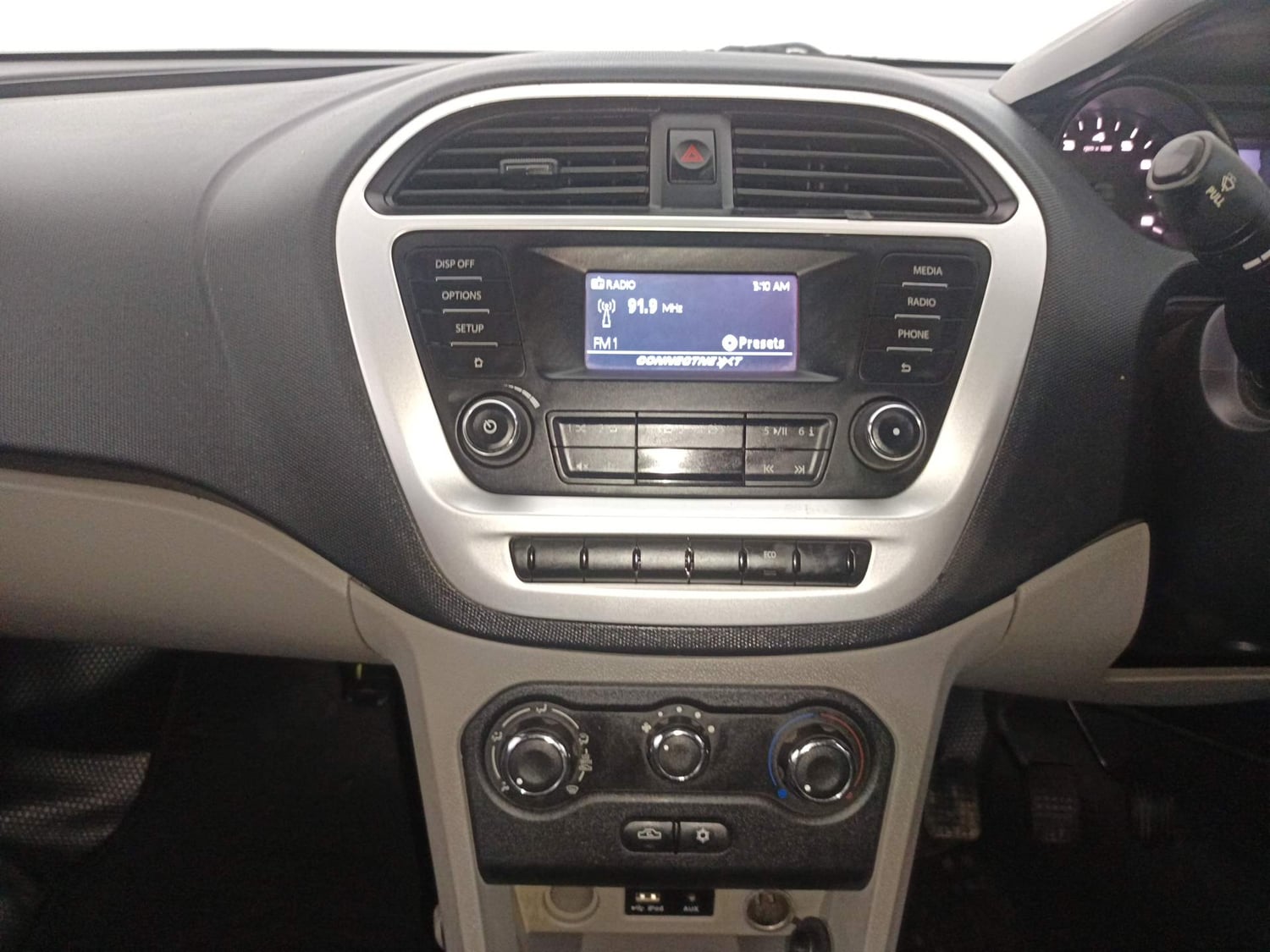 Used 2016 Tata Tiago Revotron XT Petrol Manual interior MUSIC SYSTEM & AC CONTROL VIEW