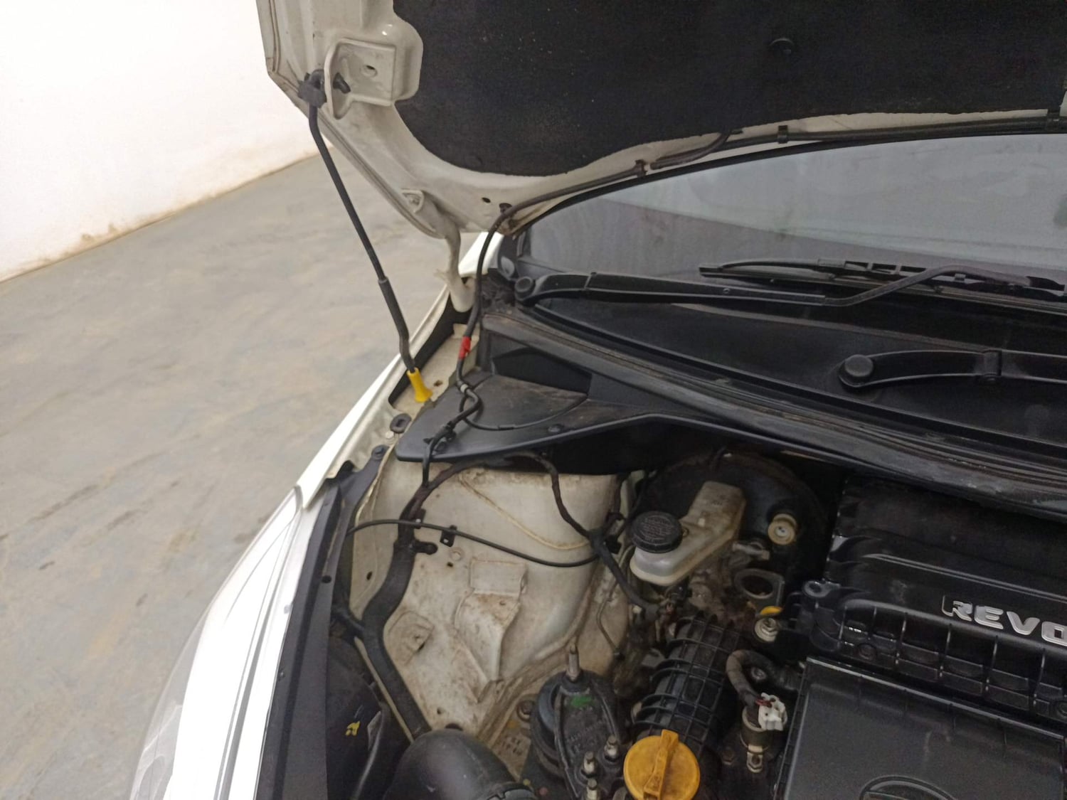 Used 2016 Tata Tiago Revotron XT Petrol Manual engine ENGINE RIGHT SIDE HINGE & APRON VIEW