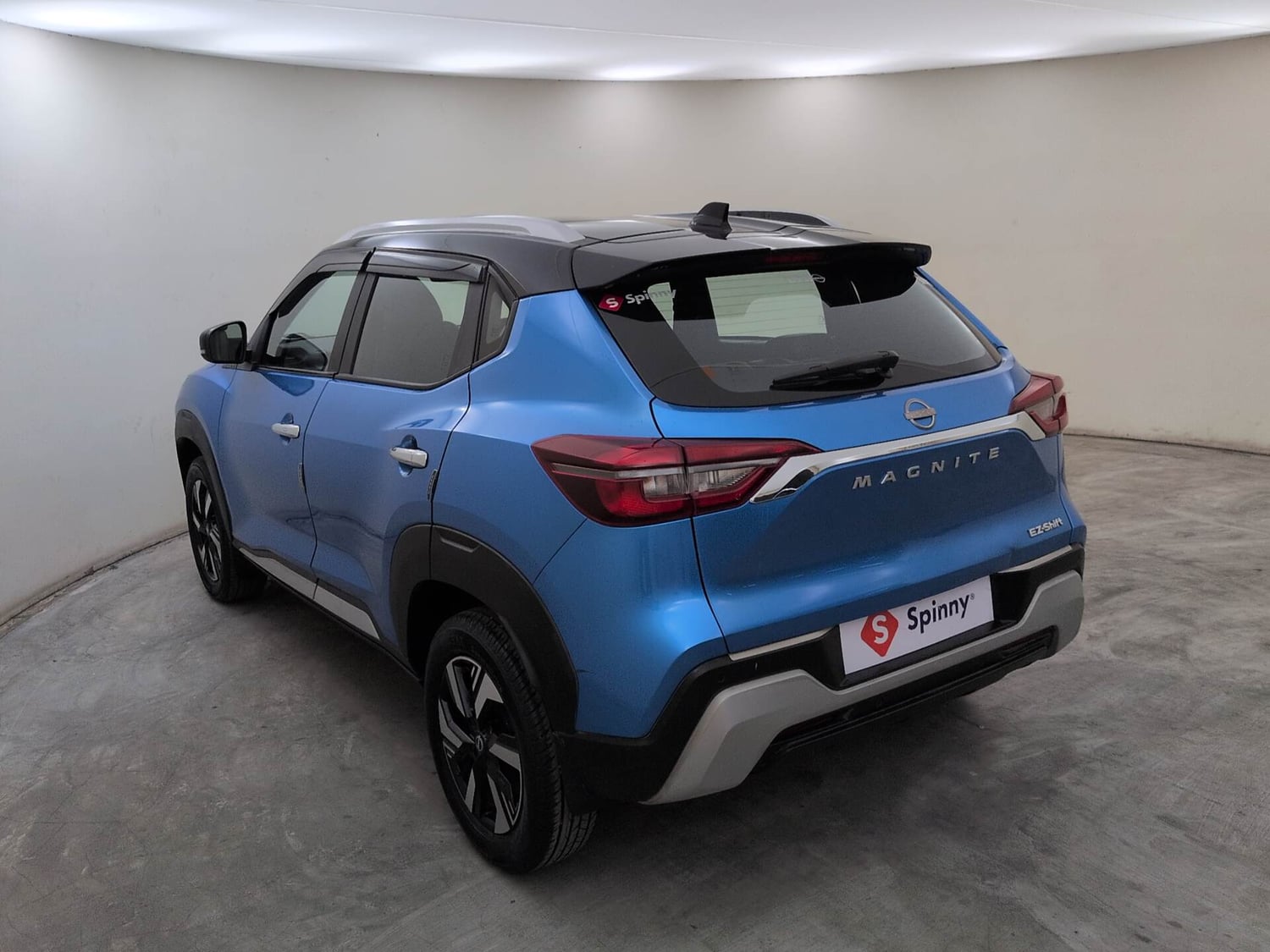 Used 2024 Nissan Magnite N-Connecta B4D 1.0 Petrol AMT Dual Tone Petrol Automatic exterior LEFT REAR CORNER VIEW
