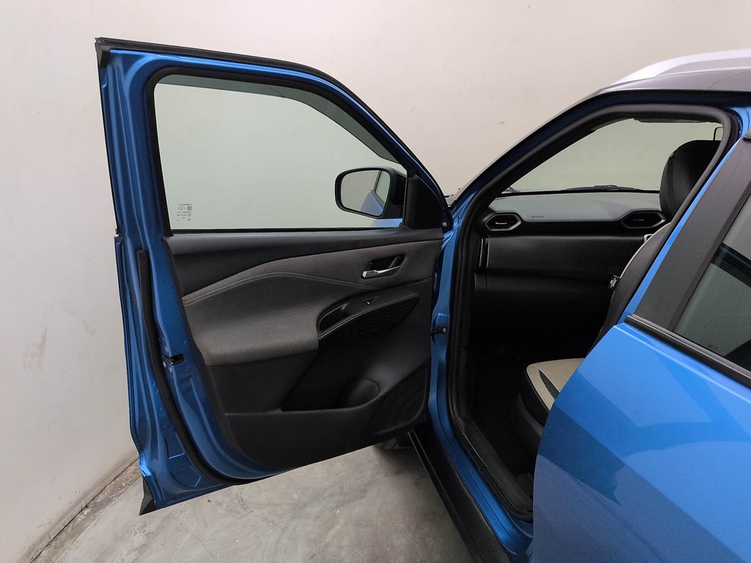 Used 2024 Nissan Magnite N-Connecta B4D 1.0 Petrol AMT Dual Tone Petrol Automatic interior LEFT FRONT DOOR OPEN VIEW