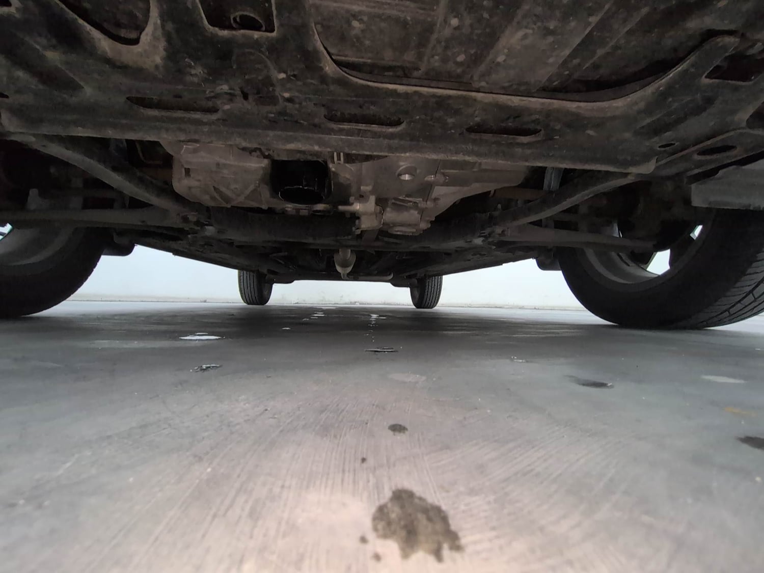 Used 2024 Nissan Magnite N-Connecta B4D 1.0 Petrol AMT Dual Tone Petrol Automatic extra FRONT LEFT UNDERBODY VIEW
