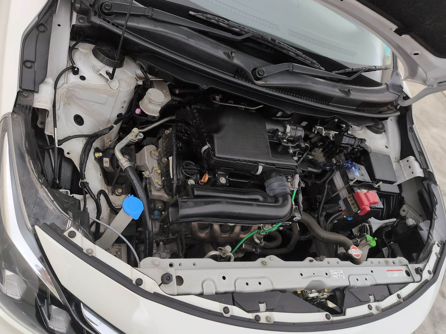 Used 2024 Maruti Suzuki Baleno Zeta MT Petrol Manual engine ENGINE RIGHT SIDE VIEW