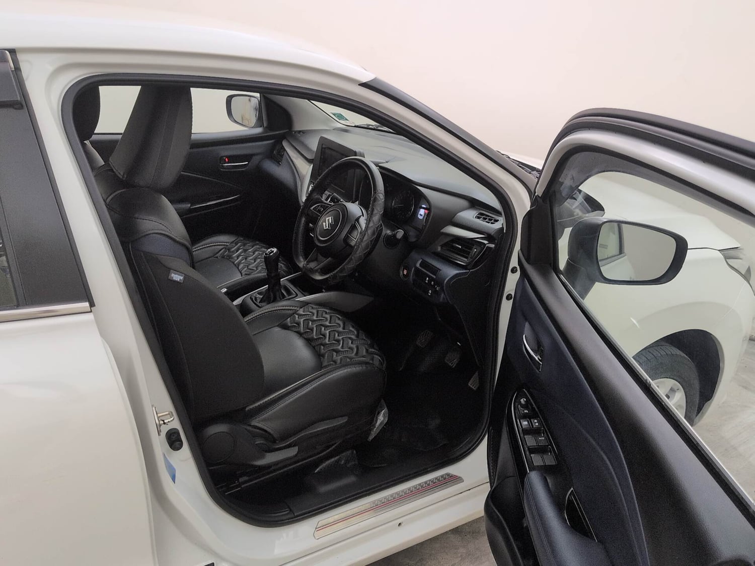 Used 2024 Maruti Suzuki Baleno Zeta MT Petrol Manual interior RIGHT SIDE FRONT DOOR CABIN VIEW
