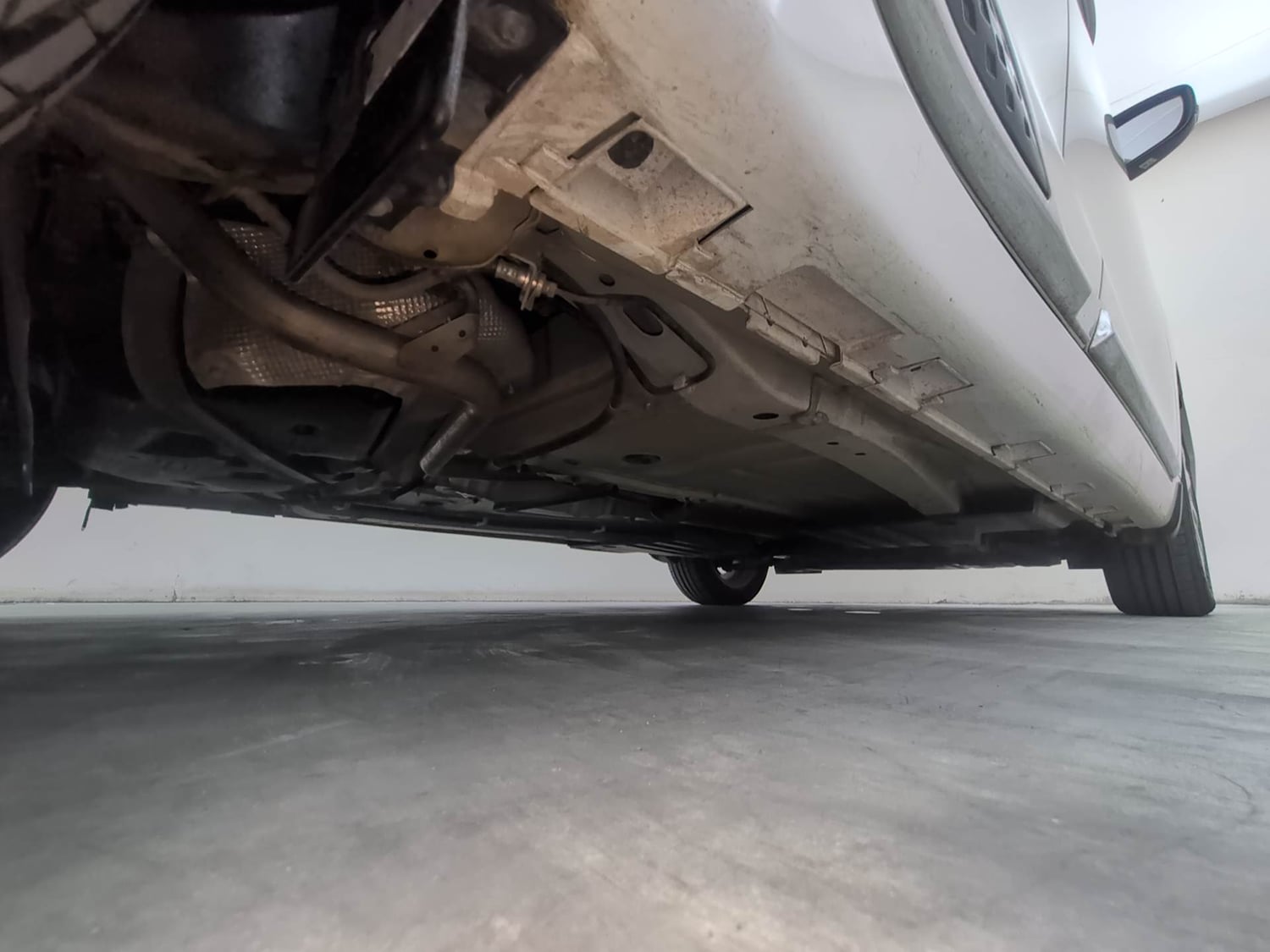 Used 2024 Maruti Suzuki Baleno Zeta MT Petrol Manual extra REAR RIGHT UNDERBODY VIEW