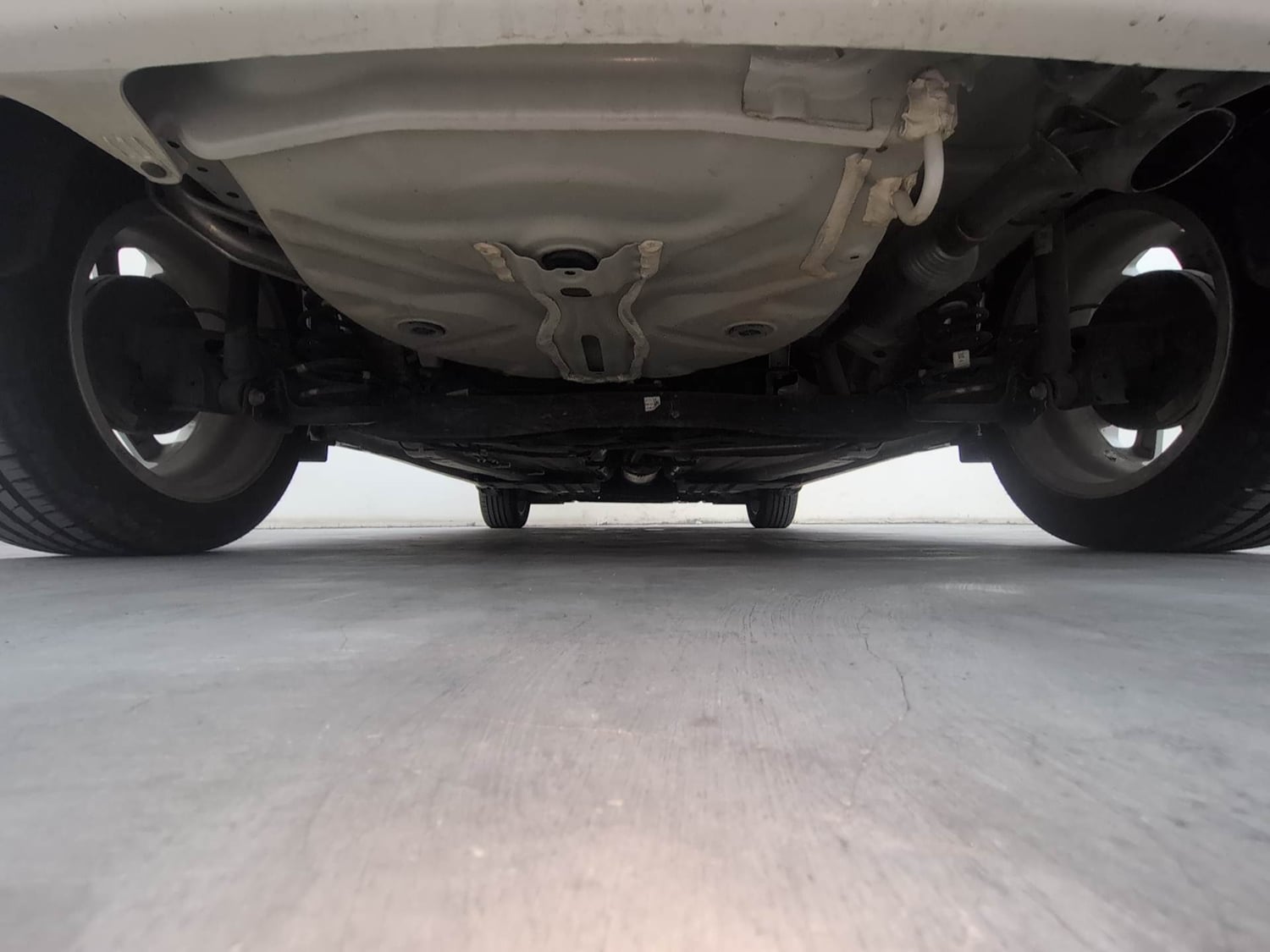 Used 2024 Maruti Suzuki Baleno Zeta MT Petrol Manual extra REAR UNDERBODY VIEW (TAKEN FROM REAR)