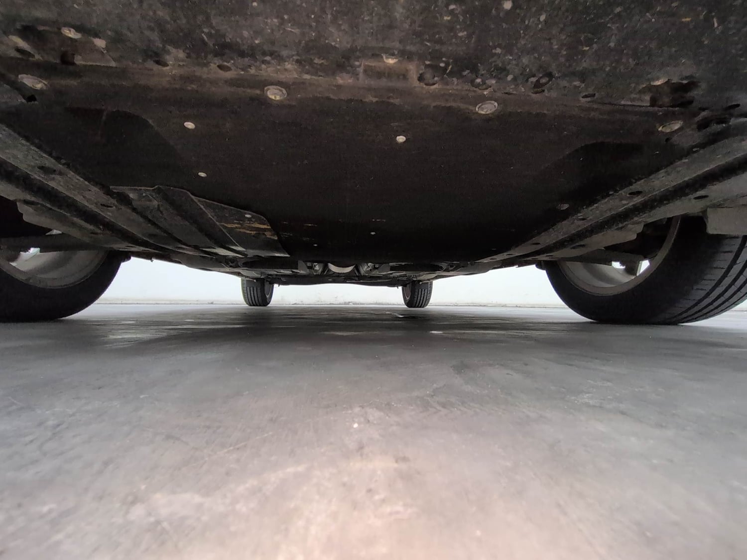 Used 2024 Maruti Suzuki Baleno Zeta MT Petrol Manual extra FRONT LEFT UNDERBODY VIEW