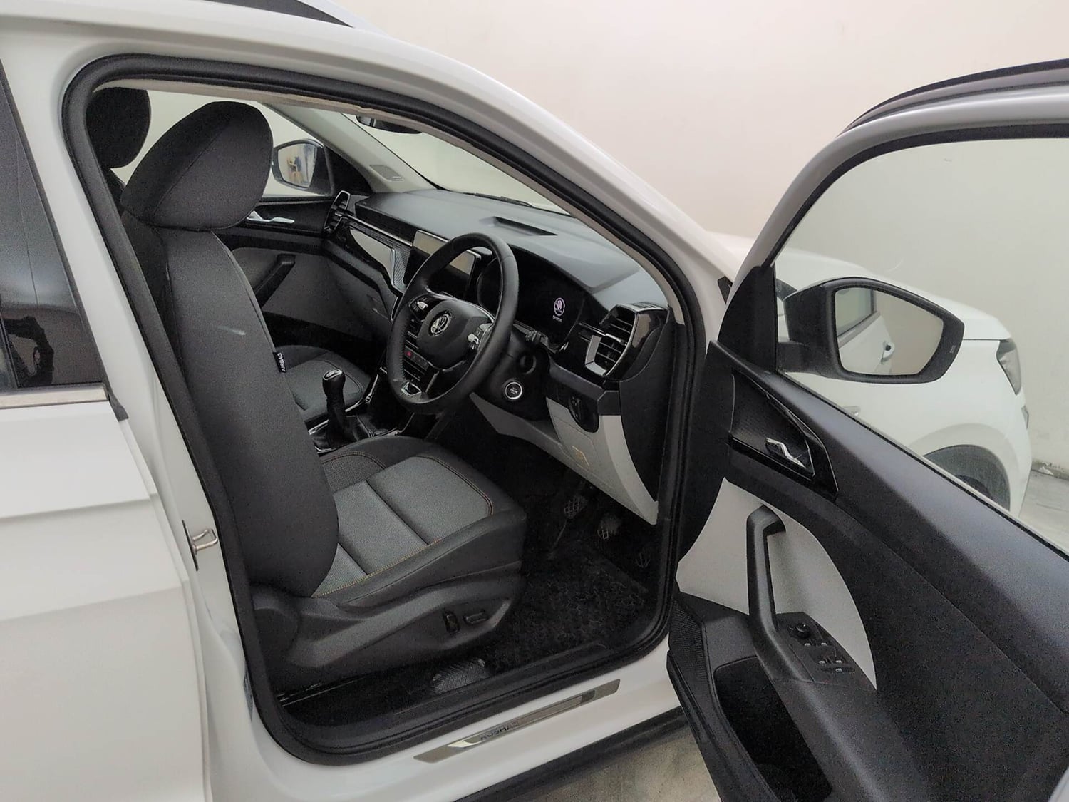 Used 2025 Skoda Kushaq Style 1.5L TSI MT Petrol Manual interior RIGHT SIDE FRONT DOOR CABIN VIEW