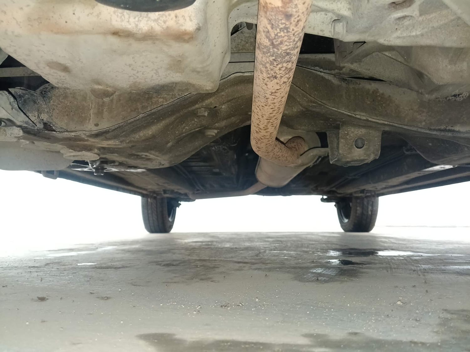 Used 2017 Maruti Suzuki Celerio VXi AMT Petrol Automatic extra FRONT LEFT UNDERBODY VIEW