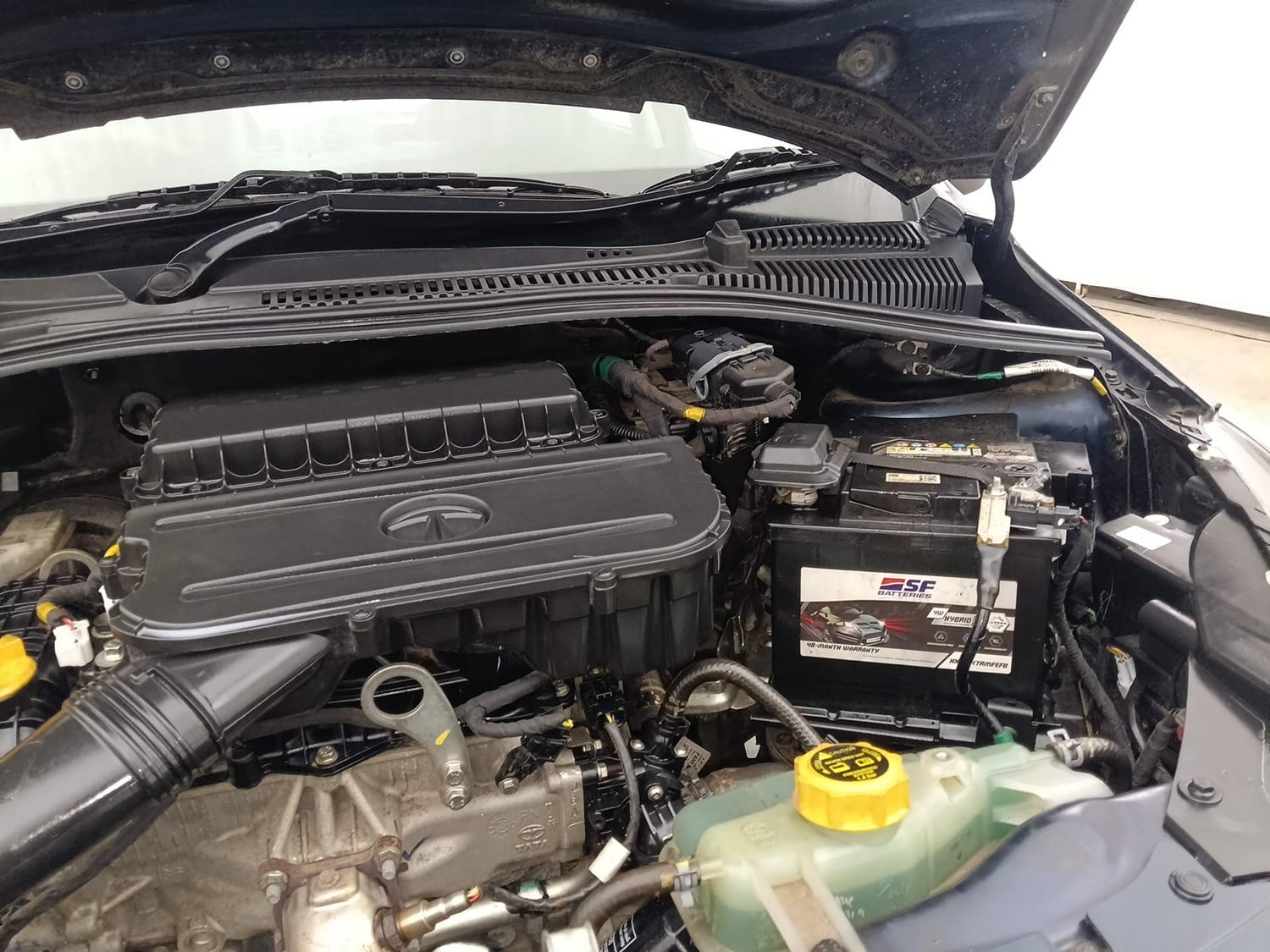 Used 2021 Tata Tiago XZ Plus Petrol Manual engine ENGINE LEFT SIDE HINGE & APRON VIEW