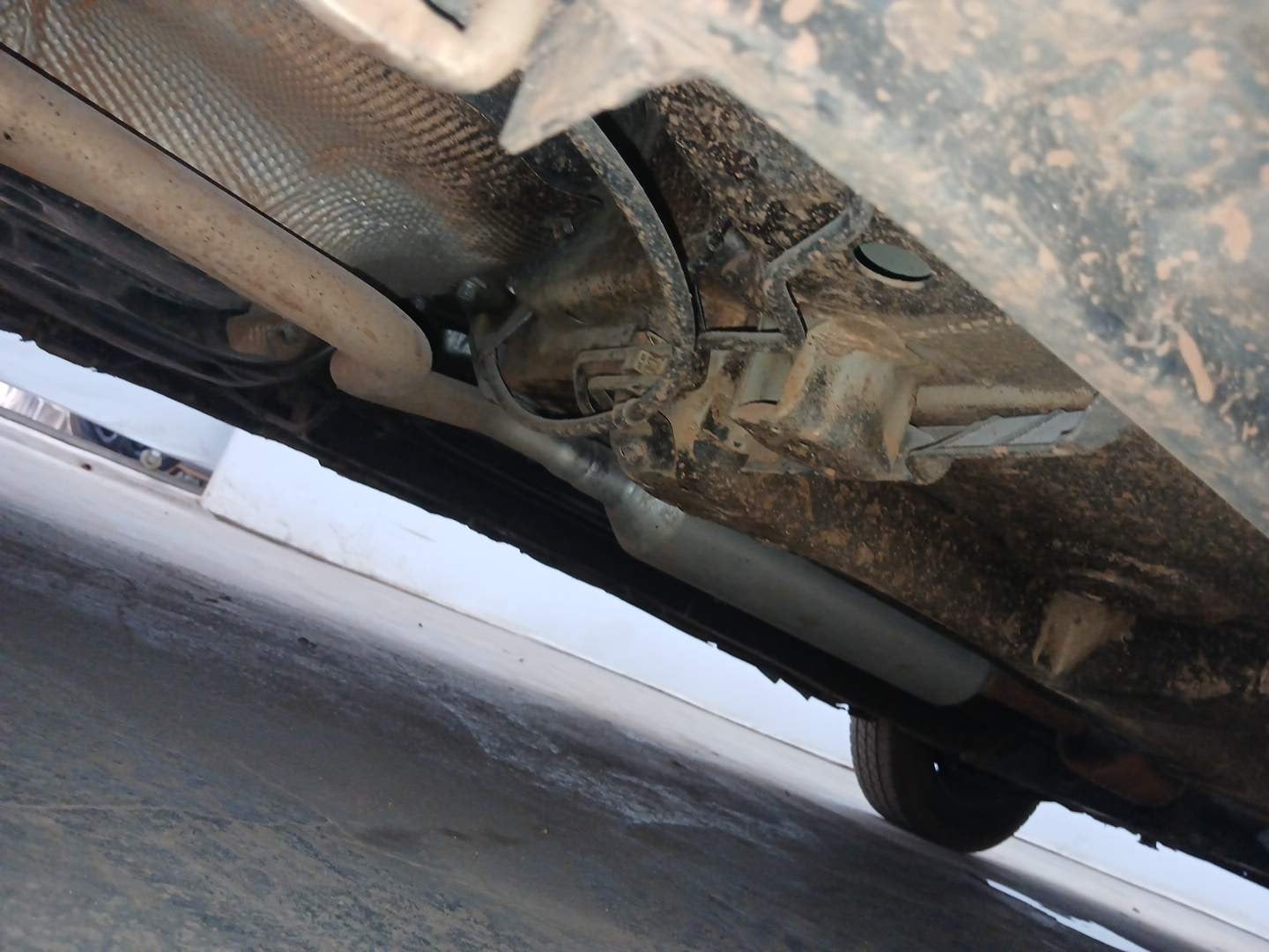 Used 2014 Maruti Suzuki Swift Dzire VXI Petrol Manual extra REAR RIGHT UNDERBODY VIEW