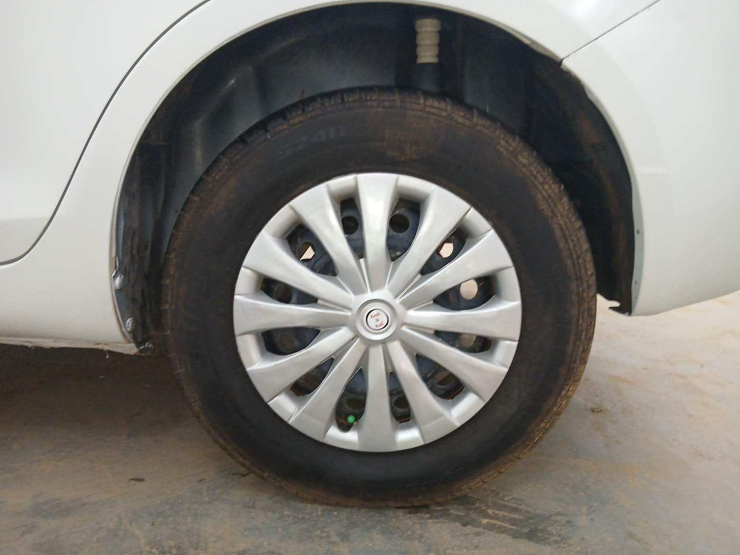 Used 2014 Maruti Suzuki Swift Dzire VXI Petrol Manual tyres LEFT REAR TYRE RIM VIEW