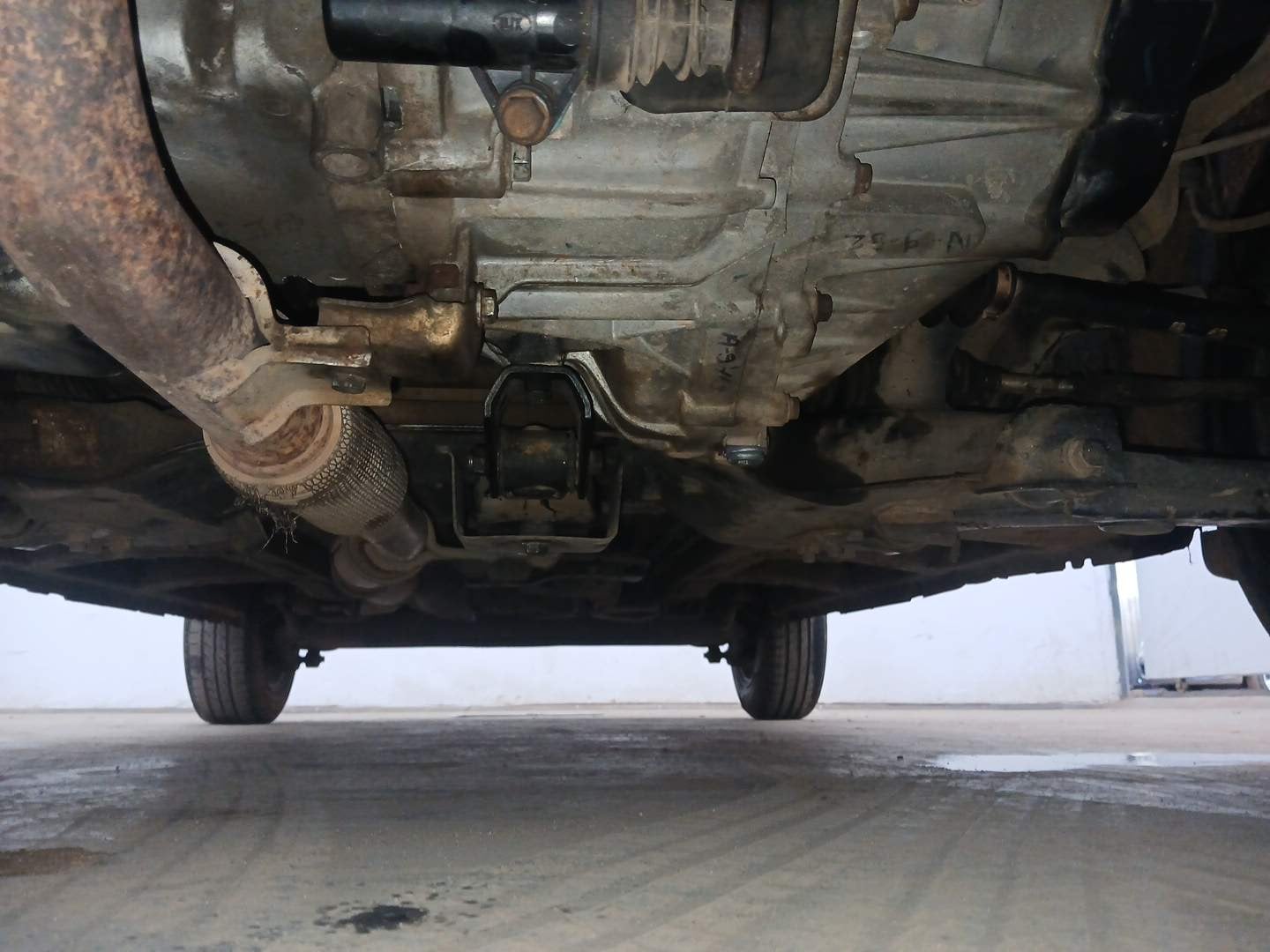 Used 2019 Mahindra KUV100 NXT K2 6 STR Petrol Manual extra FRONT LEFT UNDERBODY VIEW
