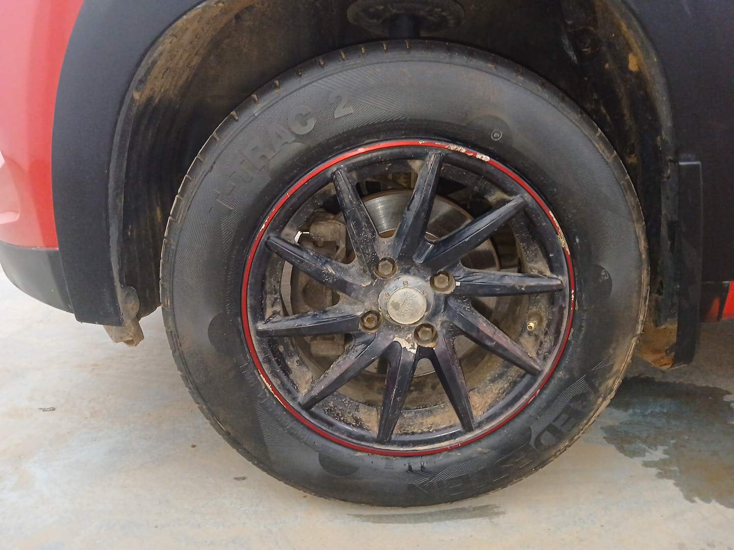 Used 2019 Mahindra KUV100 NXT K2 6 STR Petrol Manual tyres LEFT FRONT TYRE RIM VIEW