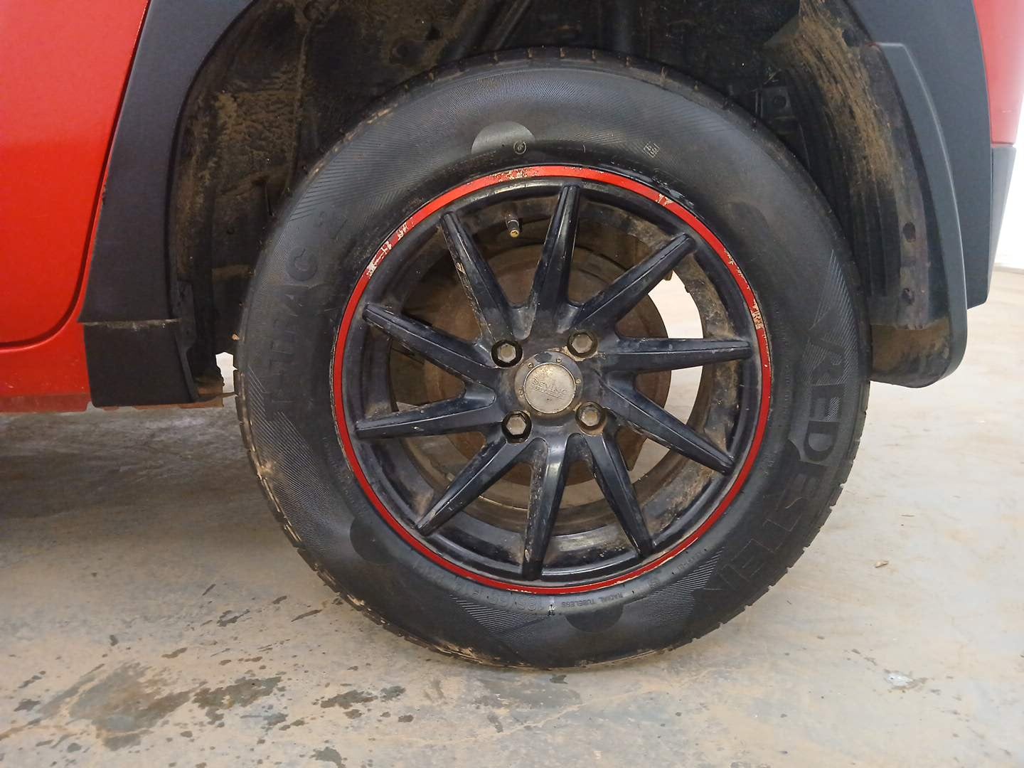 Used 2019 Mahindra KUV100 NXT K2 6 STR Petrol Manual tyres LEFT REAR TYRE RIM VIEW