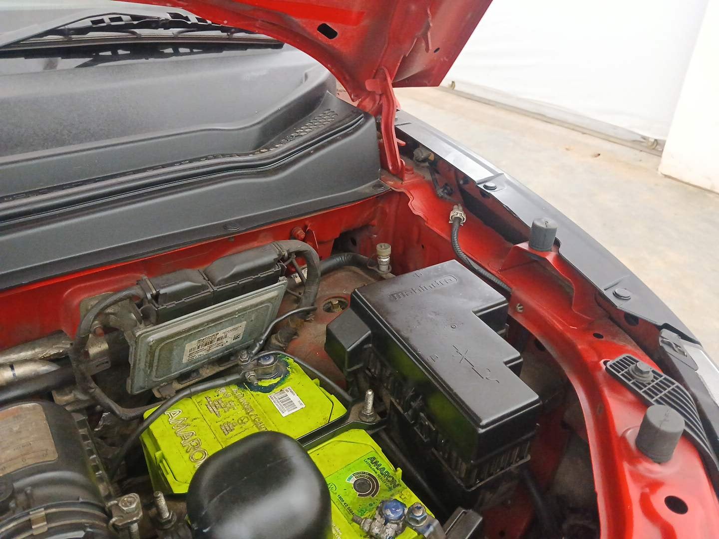 Used 2019 Mahindra KUV100 NXT K2 6 STR Petrol Manual engine ENGINE LEFT SIDE HINGE & APRON VIEW