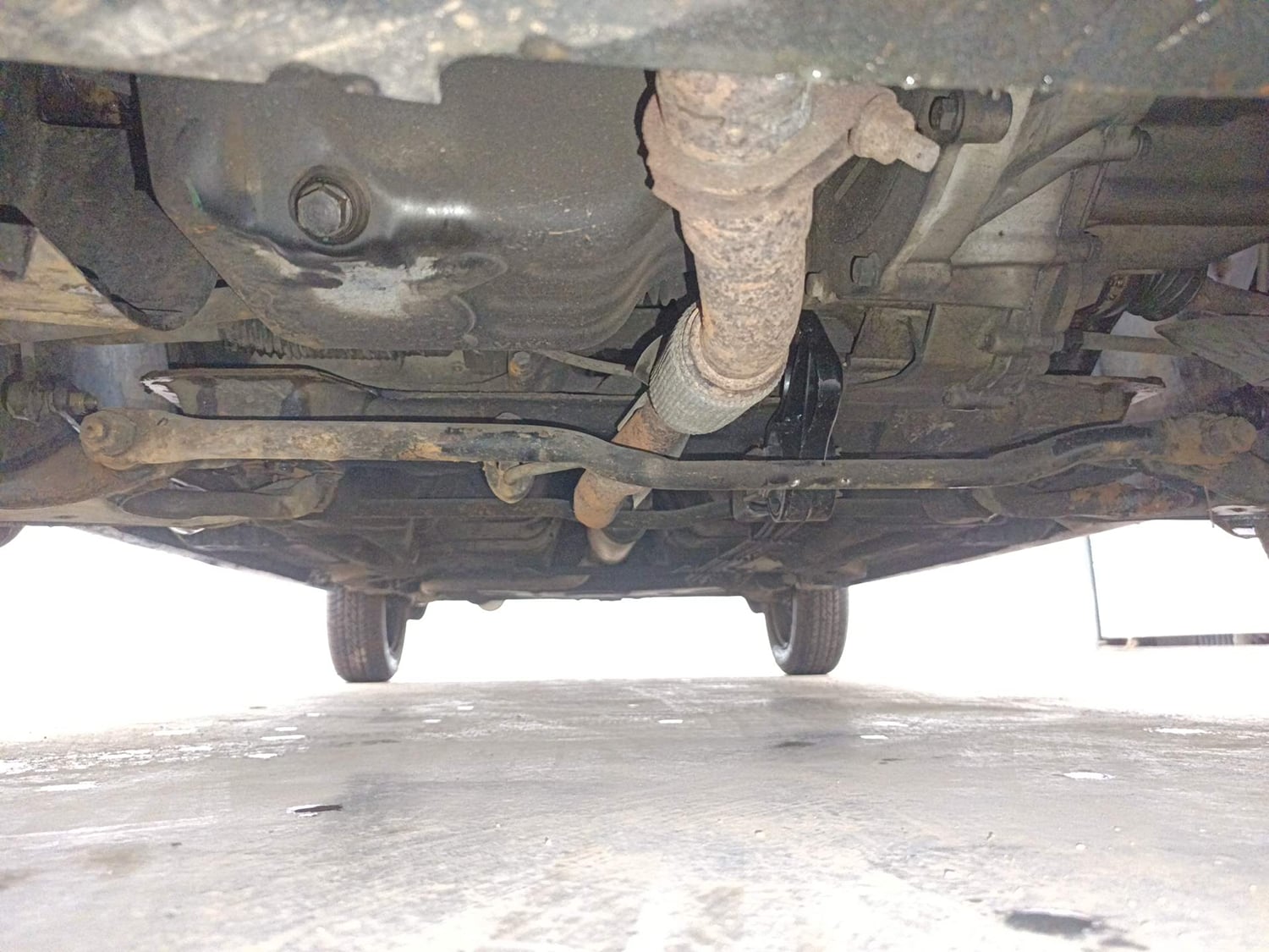 Used 2019 Tata Tiago Revotron XT Petrol Manual extra FRONT LEFT UNDERBODY VIEW