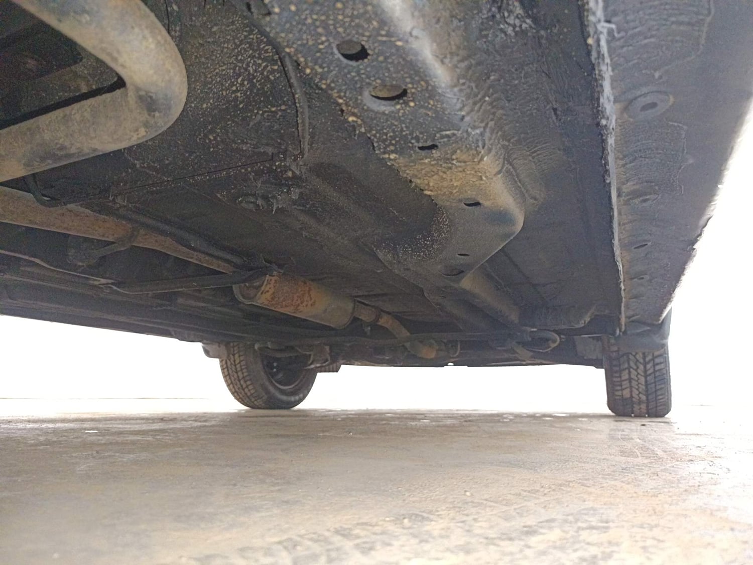 Used 2019 Tata Tiago Revotron XT Petrol Manual extra REAR RIGHT UNDERBODY VIEW