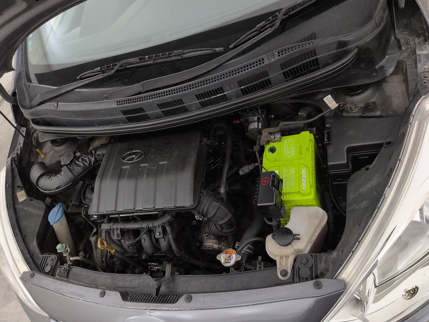 Used 2019 Hyundai Grand i10 Magna 1.2 Kappa VTVT Petrol Manual engine ENGINE LEFT SIDE VIEW