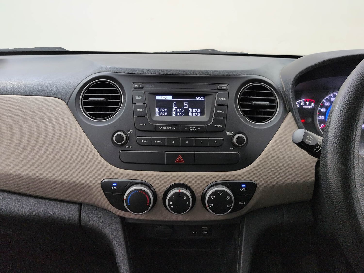 Used 2019 Hyundai Grand i10 Magna 1.2 Kappa VTVT Petrol Manual interior MUSIC SYSTEM & AC CONTROL VIEW