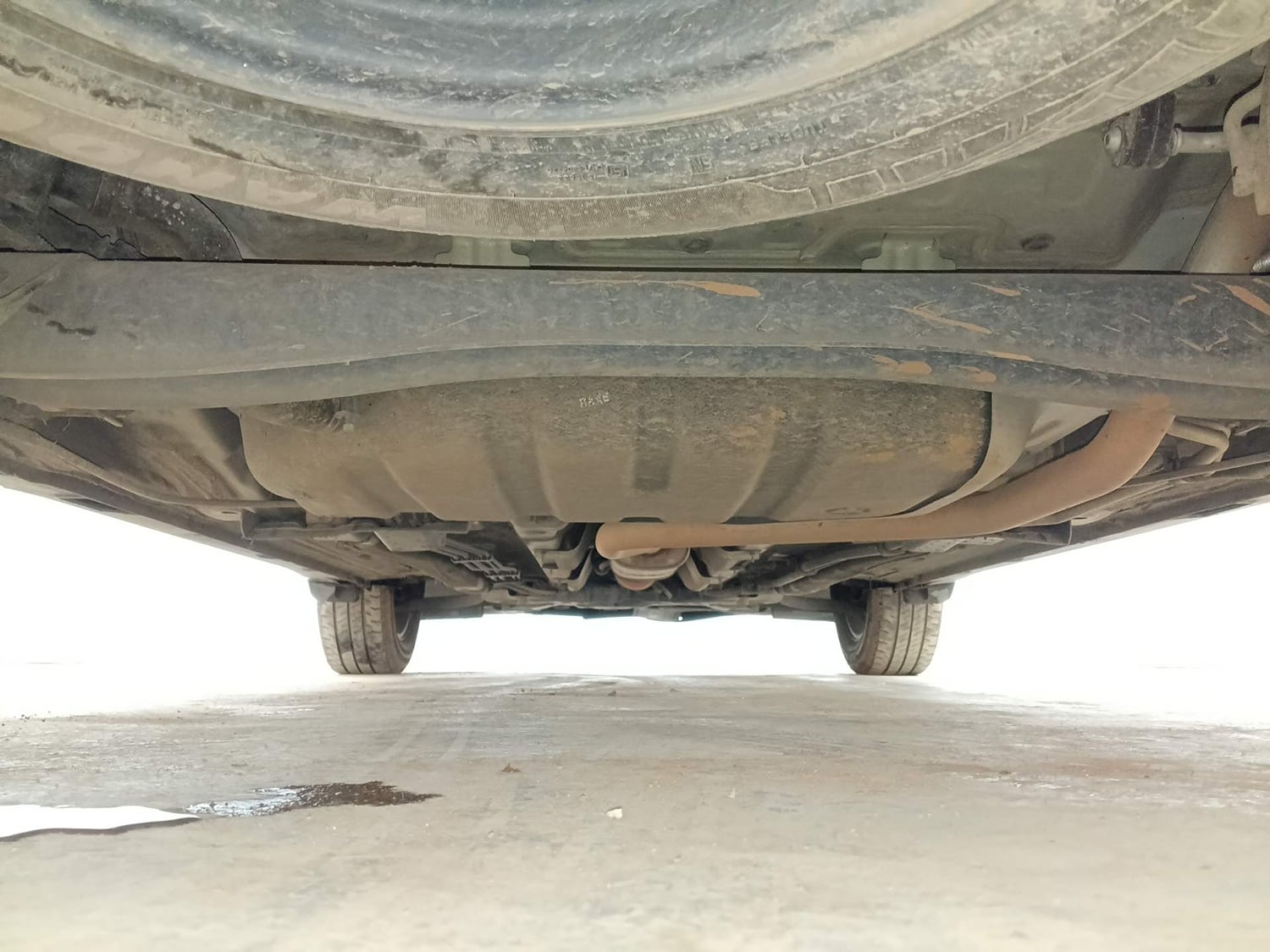 Used 2022 Kia Carens Luxury Plus 1.4 Petrol DCT 6 STR Petrol Automatic extra REAR UNDERBODY VIEW (TAKEN FROM REAR)