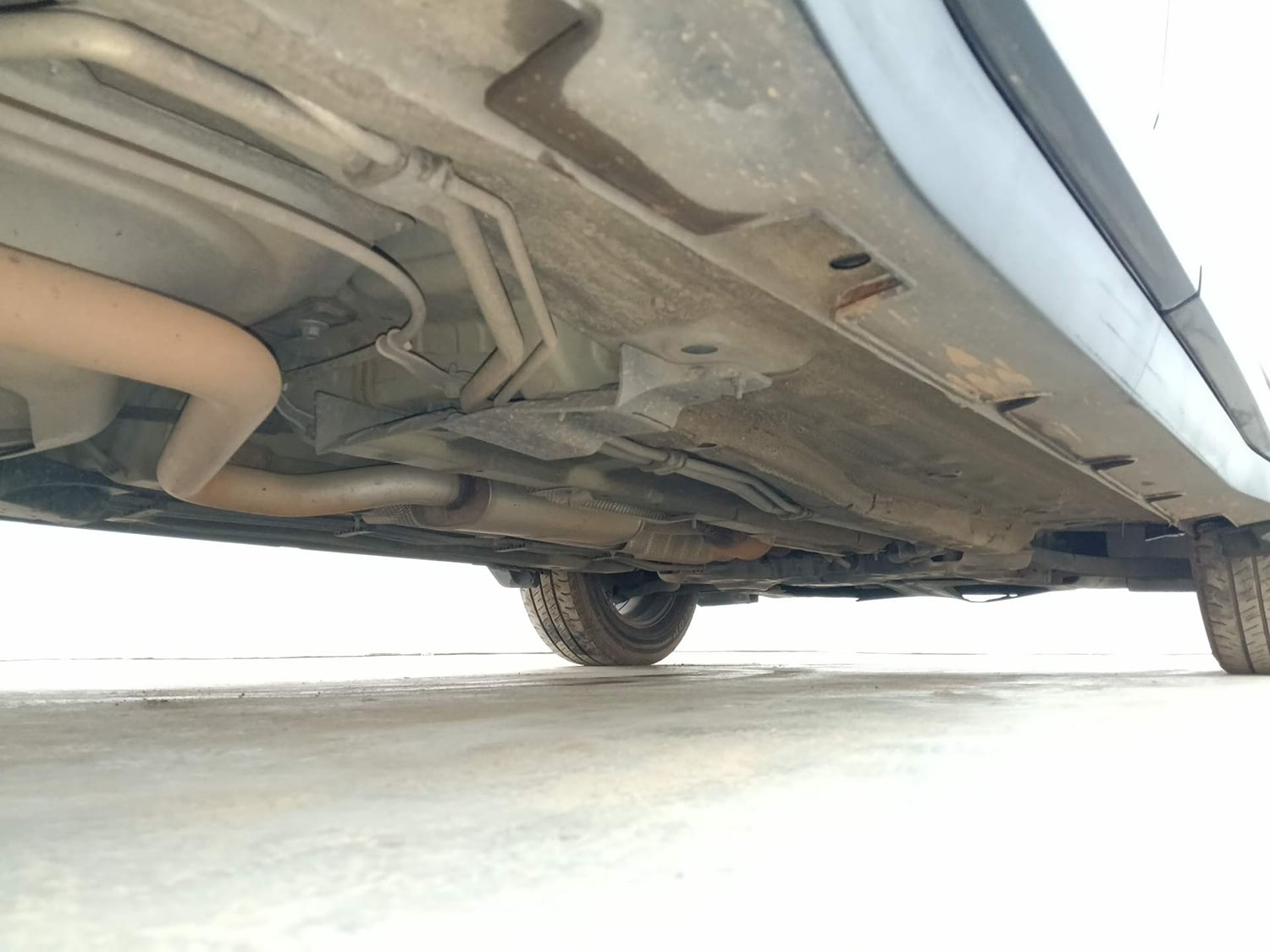 Used 2022 Kia Carens Luxury Plus 1.4 Petrol DCT 6 STR Petrol Automatic extra REAR RIGHT UNDERBODY VIEW