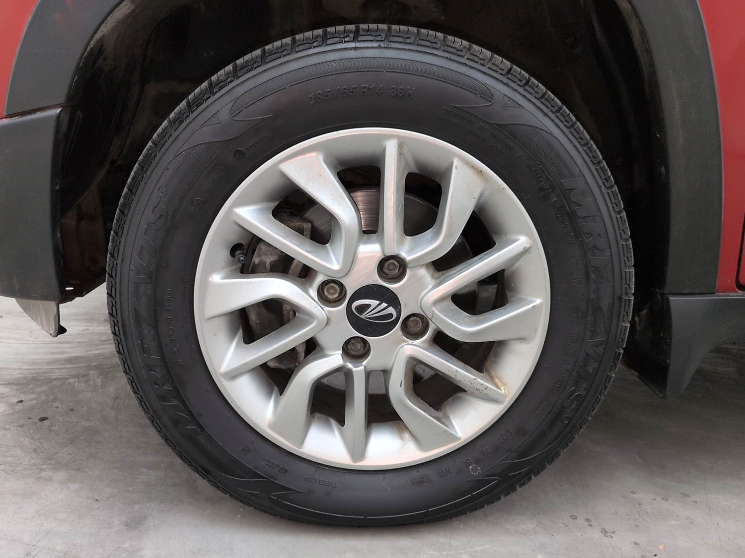 Used 2017 Mahindra KUV100 K6 6 STR Petrol Manual tyres LEFT FRONT TYRE RIM VIEW
