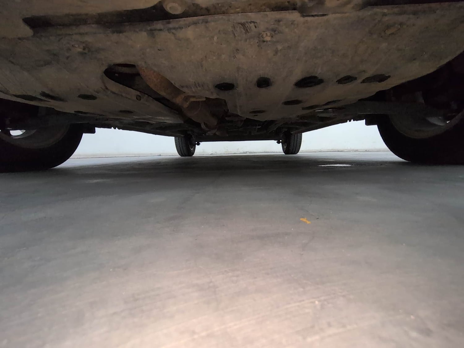 Used 2017 Mahindra KUV100 K6 6 STR Petrol Manual extra FRONT LEFT UNDERBODY VIEW