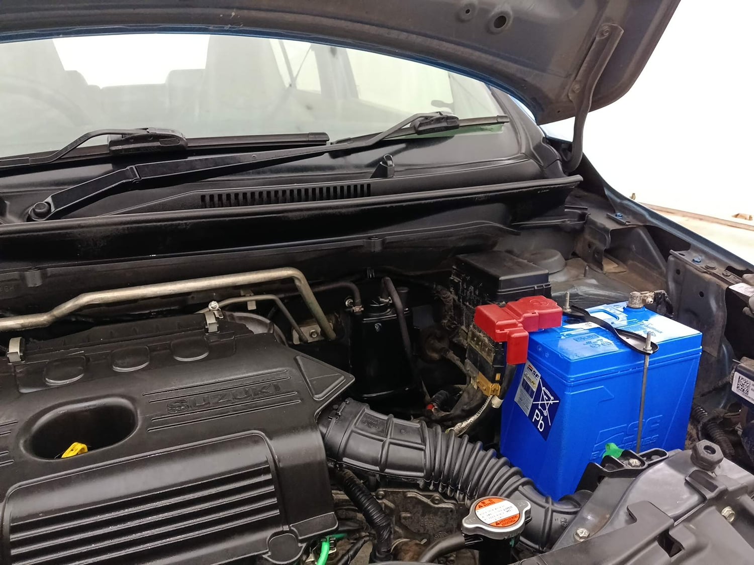Used 2017 Maruti Suzuki Celerio VXI (O) AMT Petrol Automatic engine ENGINE LEFT SIDE HINGE & APRON VIEW
