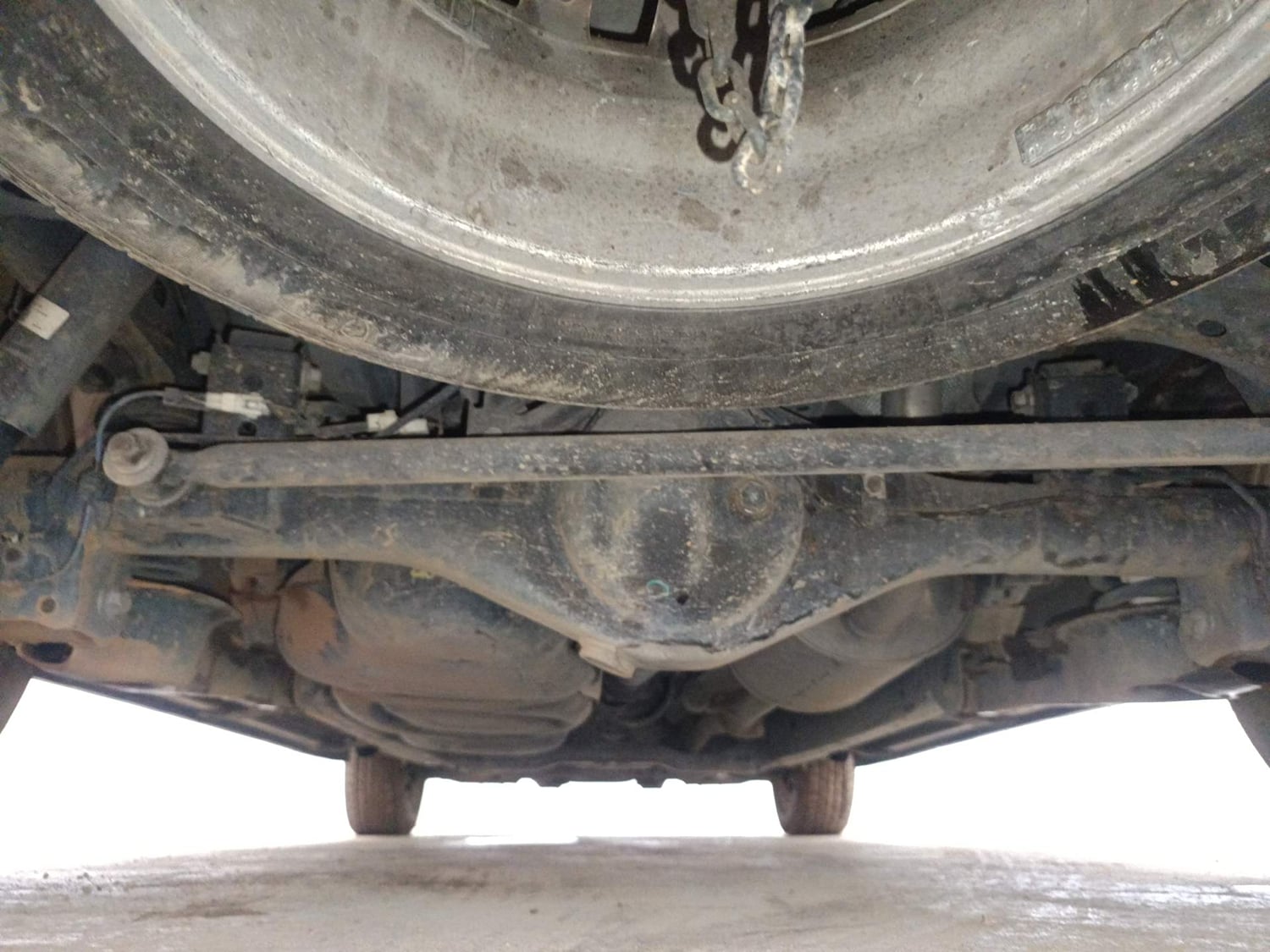 Used 2019 Toyota Innova Crysta 2.8 GX AT 7 STR Diesel Automatic extra REAR UNDERBODY VIEW (TAKEN FROM REAR)