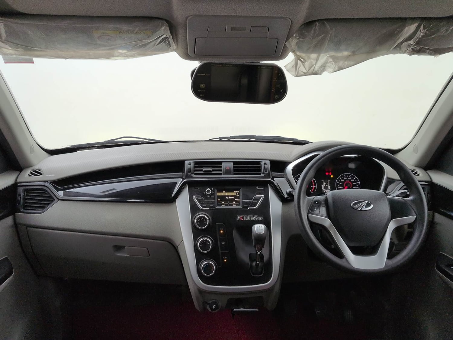 Used 2017 Mahindra KUV100 K8 6 STR Petrol Manual interior DASHBOARD VIEW