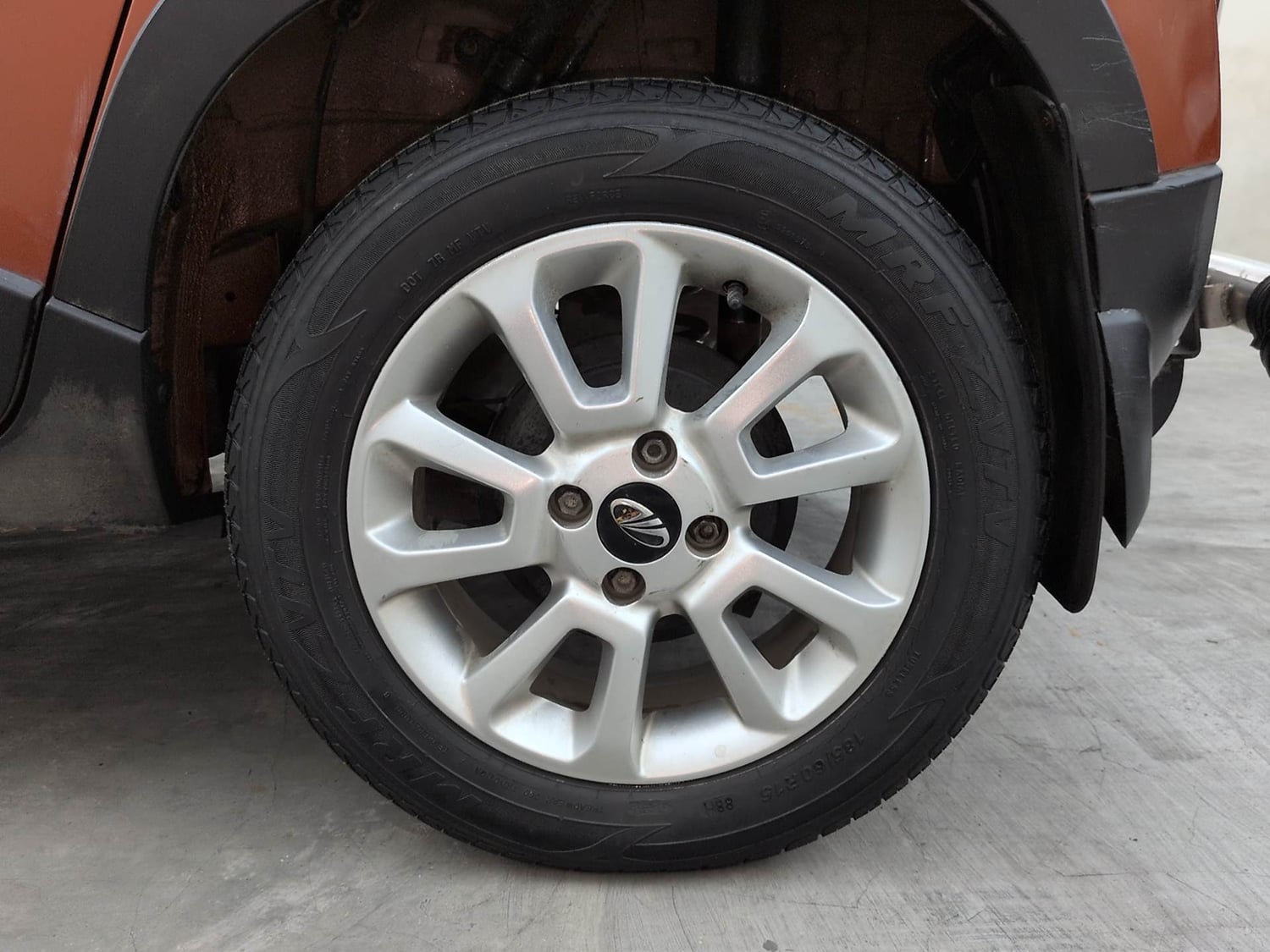 Used 2017 Mahindra KUV100 K8 6 STR Petrol Manual tyres LEFT REAR TYRE RIM VIEW