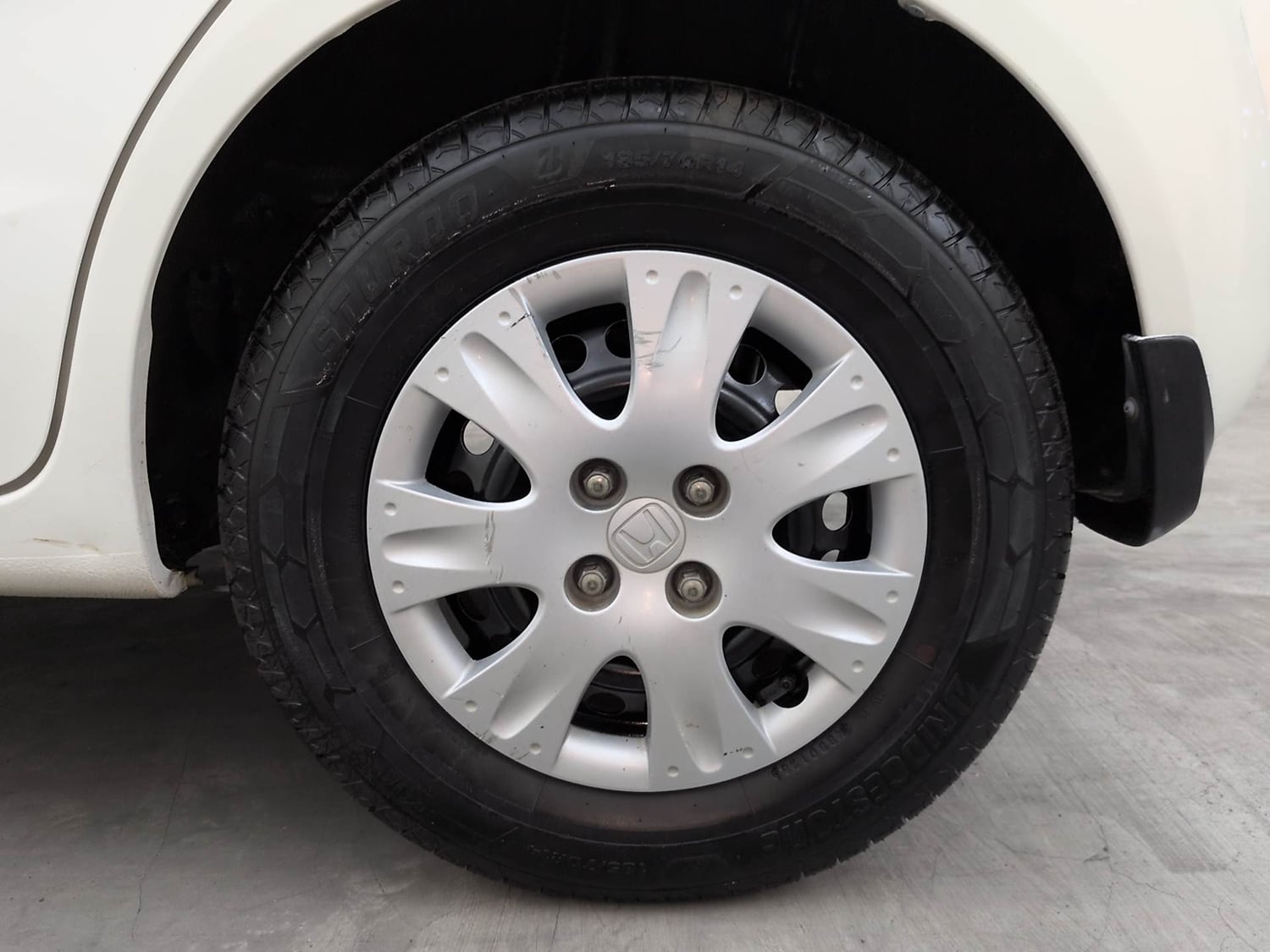Used 2016 Honda Brio S MT Petrol Manual tyres LEFT REAR TYRE RIM VIEW