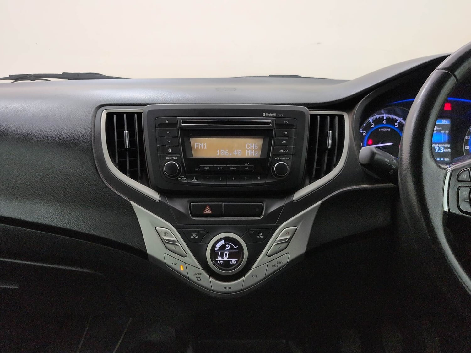 Used 2017 Maruti Suzuki Baleno Zeta 1.2 Petrol Manual interior MUSIC SYSTEM & AC CONTROL VIEW