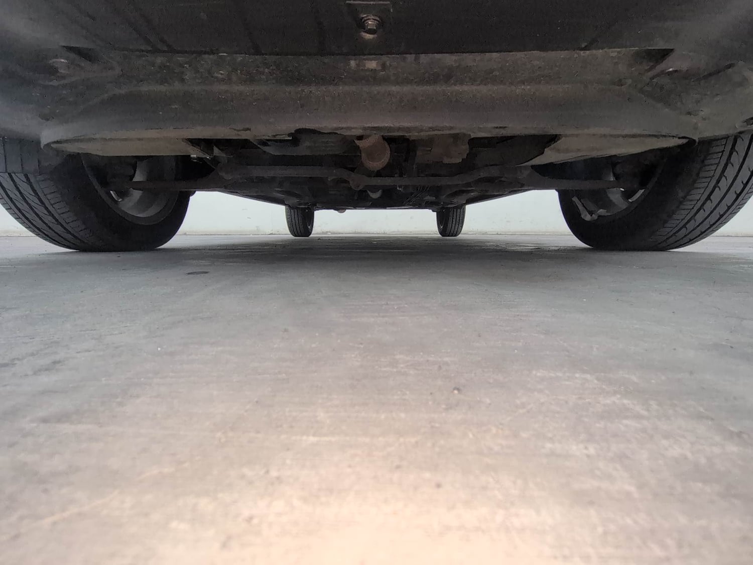 Used 2019 Tata Tigor Revotron XZ+ Petrol Manual extra FRONT LEFT UNDERBODY VIEW