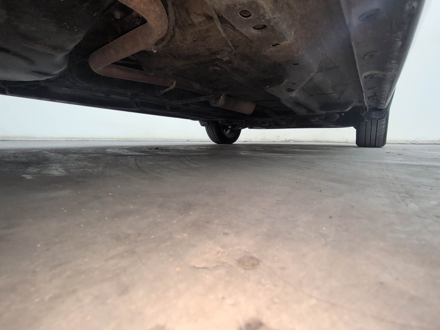Used 2019 Tata Tigor Revotron XZ+ Petrol Manual extra REAR RIGHT UNDERBODY VIEW