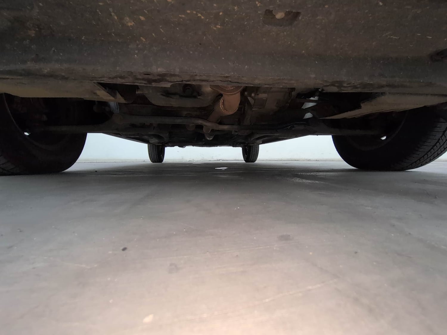 Used 2024 Tata Tiago XE Petrol Manual extra FRONT LEFT UNDERBODY VIEW