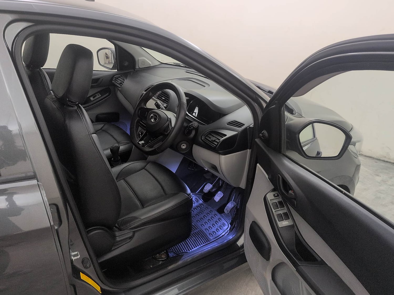 Used 2024 Tata Tiago XE Petrol Manual interior RIGHT SIDE FRONT DOOR CABIN VIEW