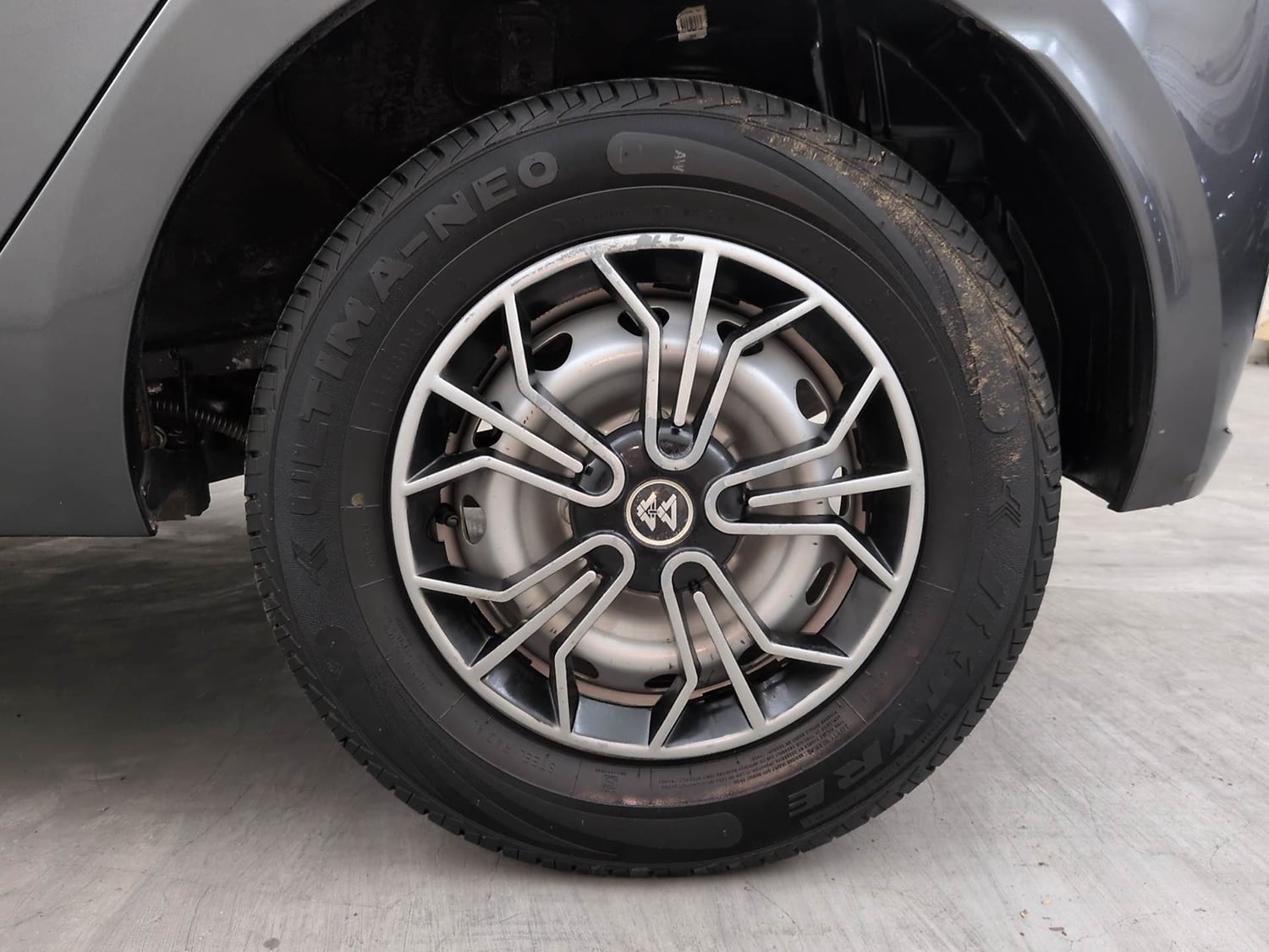 Used 2024 Tata Tiago XE Petrol Manual tyres LEFT REAR TYRE RIM VIEW