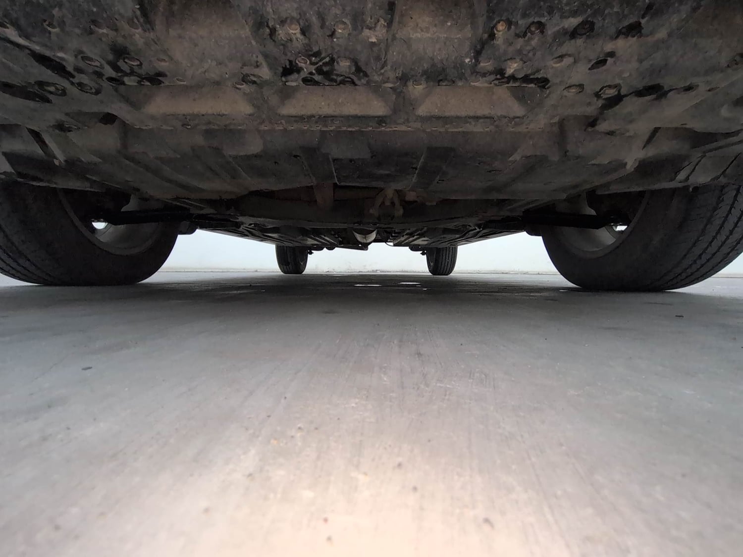Used 2022 Maruti Suzuki Grand Vitara Zeta Smart Hybrid AT Petrol Automatic extra FRONT LEFT UNDERBODY VIEW