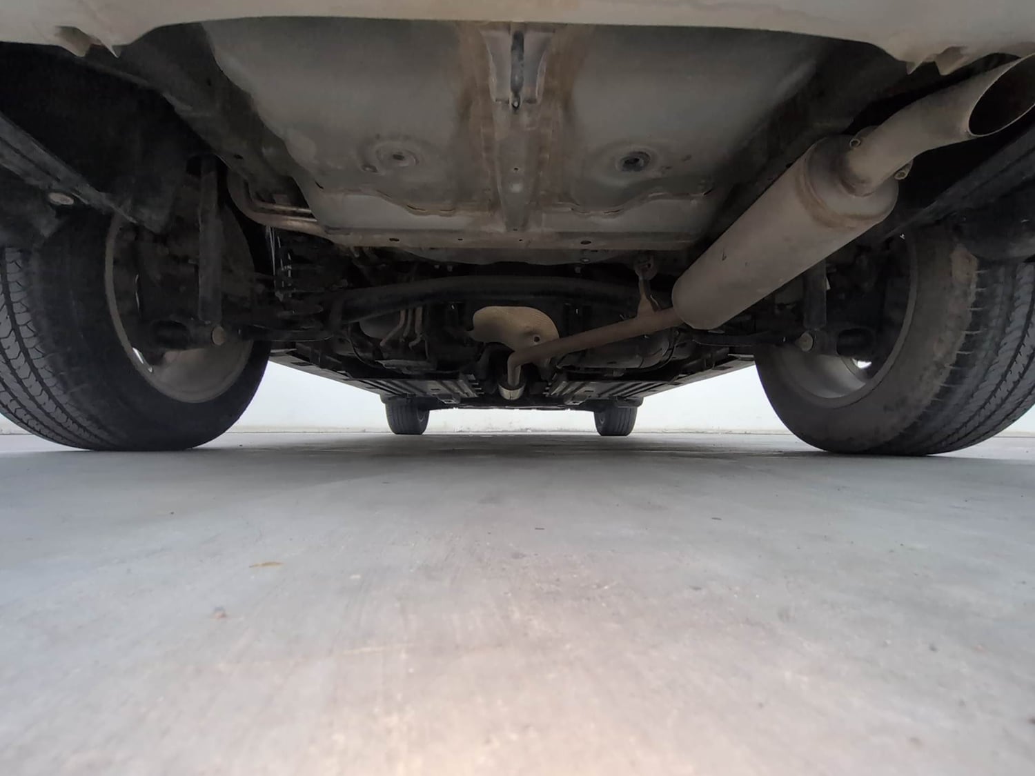 Used 2022 Maruti Suzuki Grand Vitara Zeta Smart Hybrid AT Petrol Automatic extra REAR UNDERBODY VIEW (TAKEN FROM REAR)
