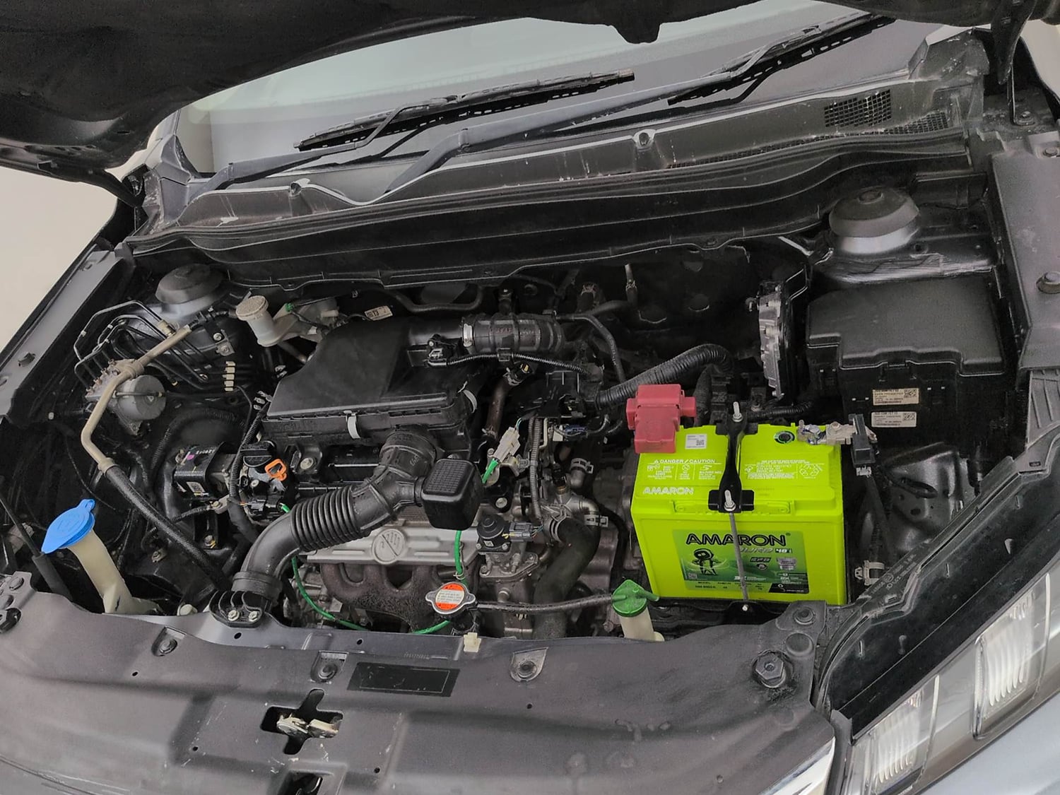 Used 2022 Maruti Suzuki Grand Vitara Zeta Smart Hybrid AT Petrol Automatic engine ENGINE LEFT SIDE VIEW